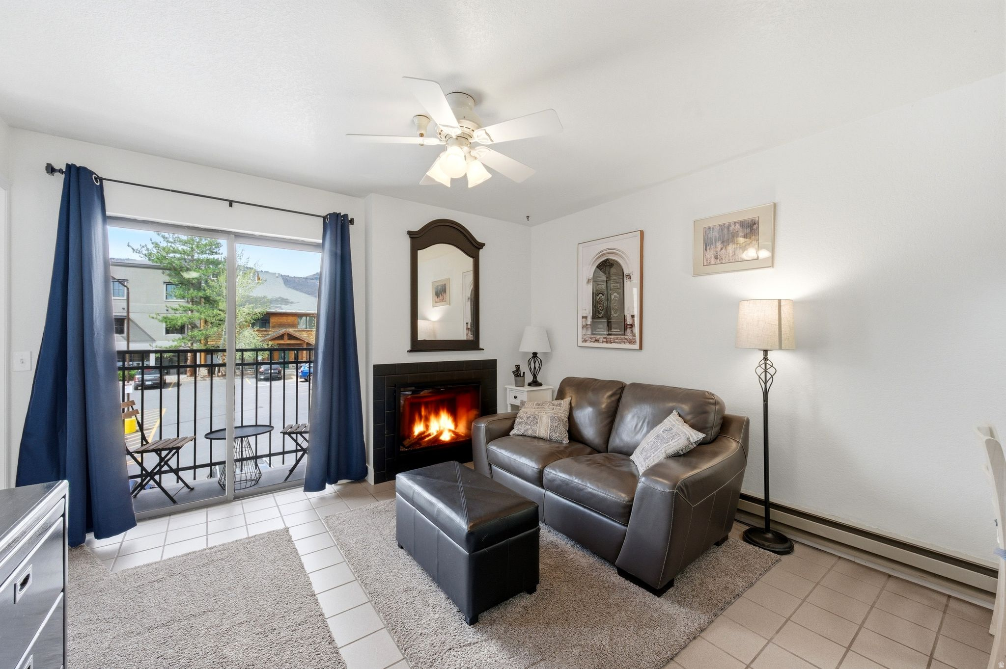 CARRIAGE HOUSE CONDO IN PARK CITY WITH SKI RUN VIEWS!  Well-appointed and fully furnished Carriage House condo in Park City's desirable Prospector neighborhood, offering versatility as a full-time residence, vacation retreat, or investment property with strong rental potential and nightly rentals permitted. Comfortable living space includes an electric fireplace, ceiling fan, and smart use of space.  A through-the-wall electric heat/A-C unit provides efficient heating for year-round comfort. Enjoy a prime location on the free bus route with easy access to Park City Mountain, Deer Valley, Historic Main Street, dining, shopping, and year-round recreation including hiking, biking, and golf. Amenities include a heated outdoor pool, indoor hot tub/spa, elevator, security entrance, and common laundry facilities. Offered turnkey for immediate enjoyment or rental income, this property combines convenience, comfort, and value in one of Park City's most accessible locations.