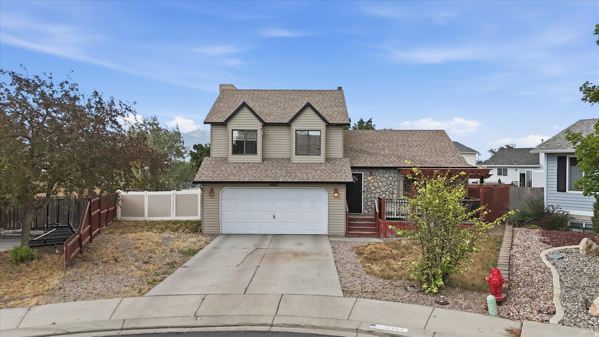 Wow!! Beautifully maintained 4-bedroom, 3-bath home on a quiet cul-de-sac in West Jordan. This move-in-ready home features over 2,100 sq. ft. of living space, a finished basement, and an updated kitchen with new quartz countertops and tile backsplash. Recent improvements include a new furnace and central A/C (2026), new water heater (2021), radon mitigation system (2021), updated main-floor bathroom, modern lighting, ceiling fans, and added garage storage. Enjoy a fully fenced backyard, attached two-car garage, and Google Fiber availability. Conveniently located near parks, schools, shopping, and dining, this home offers comfort, convenience, and lasting value. Book your showing today!!