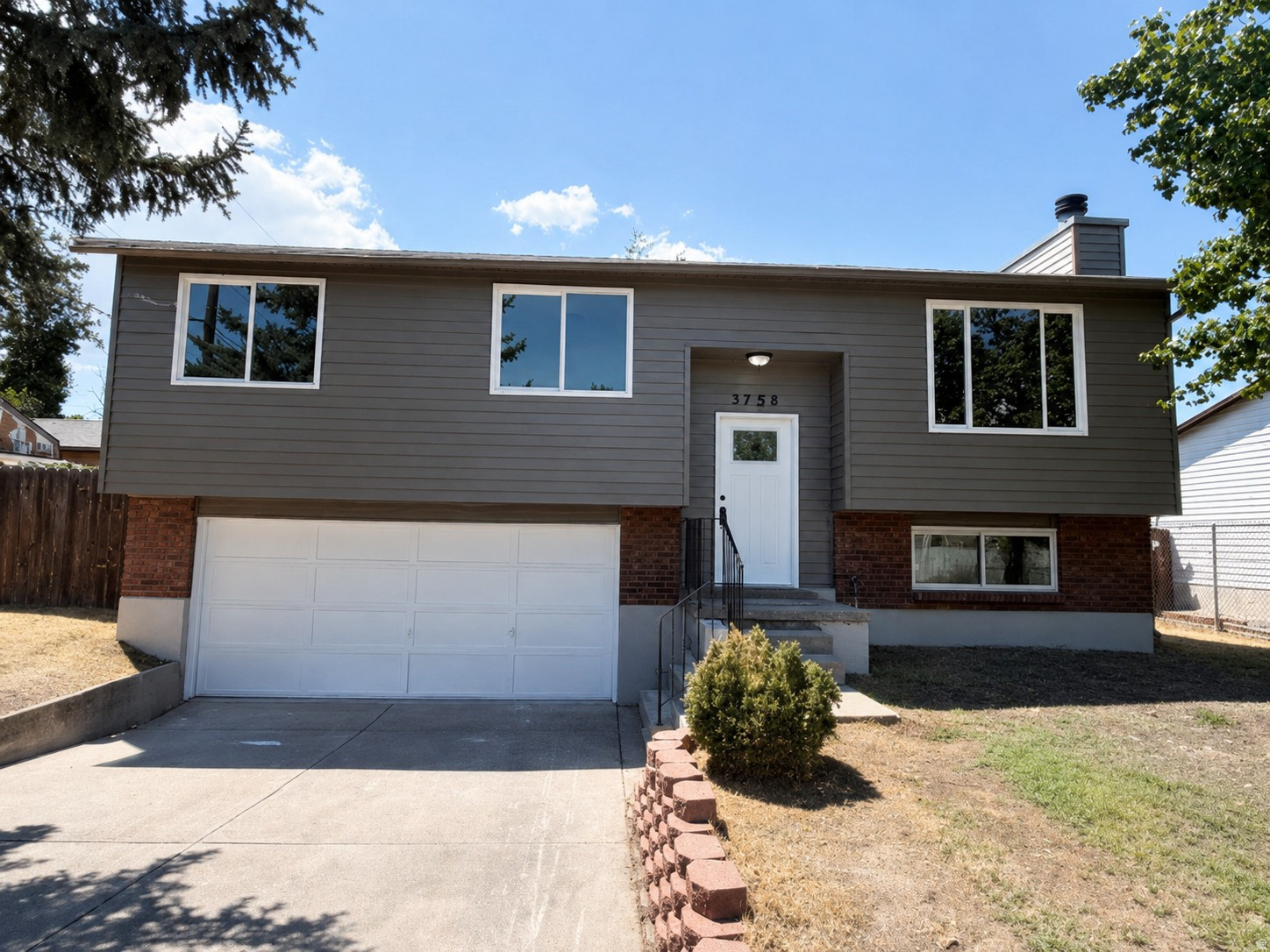 This beautifully remodeled home stands out for its exceptional condition, thoughtful updates, and clean, move-in-ready presentation. Nearly the entire home has been renovated, with the improvements professionally completed through the proper permitting process, offering buyers added confidence in the quality of the work. The functional floor plan includes three bedrooms, two bathrooms, and a spacious basement family room that could also serve as a fourth bedroom, home office, gym, or guest space. The updated interior feels fresh and inviting, while the attached two-car garage provides convenient parking and additional storage. Homes this well-maintained and extensively updated can be difficult to find at this price point. This is an excellent opportunity for a buyer looking for a home where the work has already been done, just move in and enjoy.
