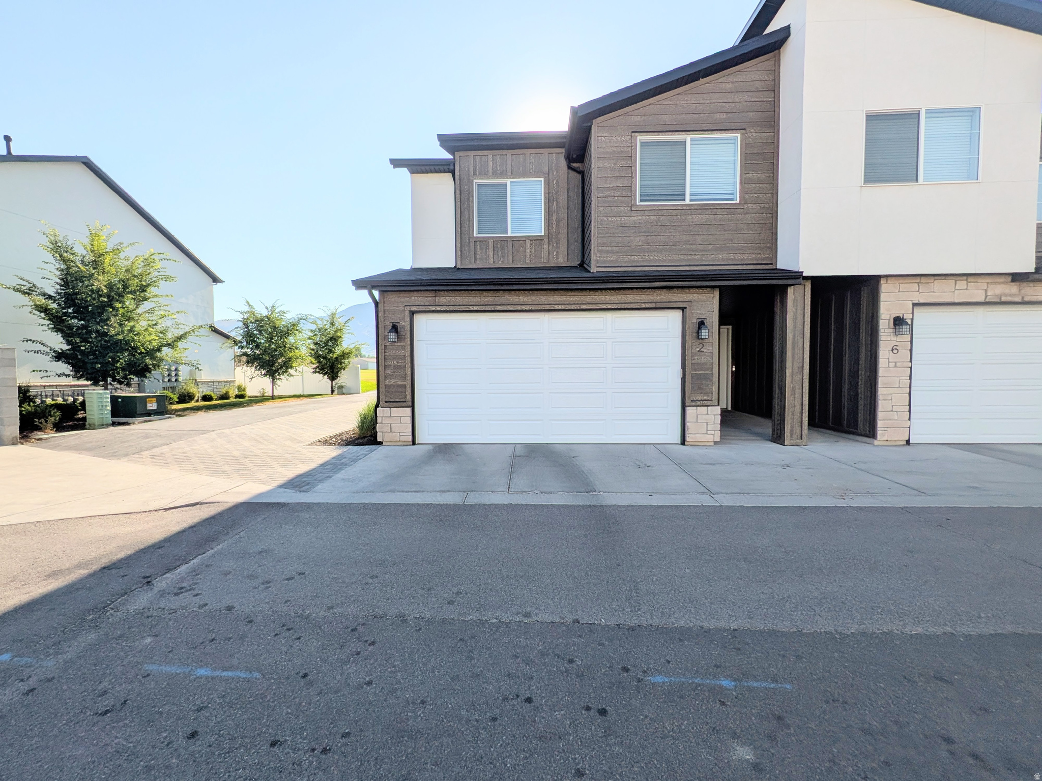 Welcome to the highly sought-after Providence Gateway community! This well maintained modern end-unit townhome offers the perfect combination of comfort, convenience, and lifestyle. Featuring 3 bedrooms and 2.5 bathrooms, this home boasts an open-concept floorplan with stylish finishes, abundant natural light, and a functional layout designed for everyday living and entertaining. End unit that backs directly to a park, creating extra open space and beautiful views right out your back door. Residents love the incredible community amenities including a pool, clubhouse, gym, playgrounds, and pickleball courts-all located in one of Cache Valley's most desirable areas close to shopping, restaurants, and outdoor recreation. VACANT, Fridge Included, also includes a new gas range!