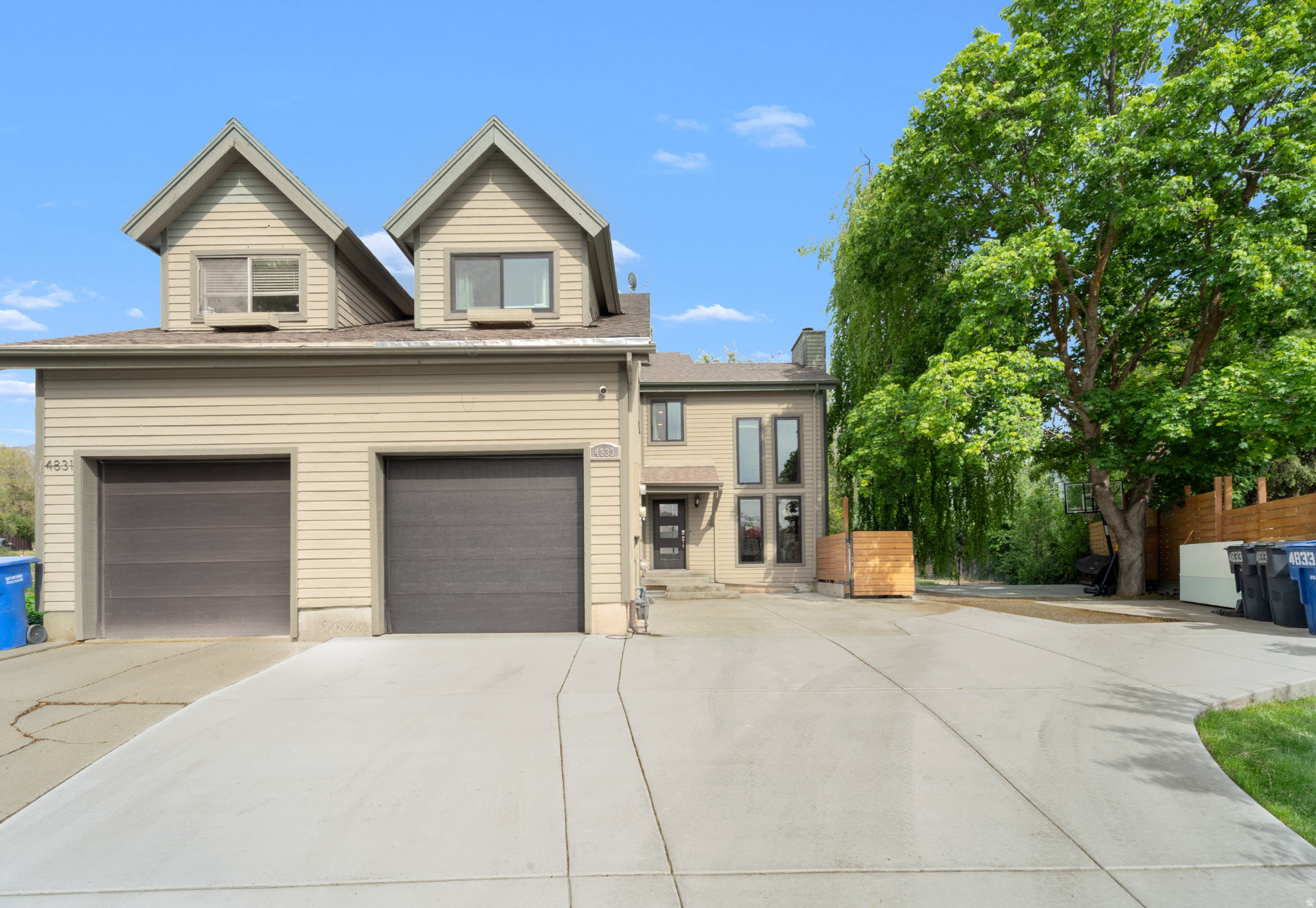 Experience living in one of Salt Lake's most prestigious and sought-after neighborhoods. Nestled among mature trees and luxury homes, this stunning residence offers an incredible combination of architectural character, natural light, and an unbeatable location. Inside, expansive oversized windows become the centerpiece of the home, flooding the living spaces with sunlight and creating a seamless connection to the surrounding landscape. The soaring glass windows brings the outdoors in, showcasing beautiful views while creating an airy, open atmosphere throughout the home. Every room feels bright, welcoming, and thoughtfully designed for both everyday living and entertaining. Located in the heart of Holladay, this home places you in one of Utah's most affluent and desirable communities. Known for its luxury estates, established tree-lined streets, and proximity to world-class outdoor recreation, Holladay continues to attract discerning buyers who value privacy, prestige, and convenience. Residents enjoy quick access to Big and Little Cottonwood Canyons, top-rated schools, upscale dining, boutique shopping, downtown Salt Lake City, and some of Utah's most exclusive neighborhoods. This is more than a home, it's an opportunity to live in a community where luxury, lifestyle, and location come together beautifully.
