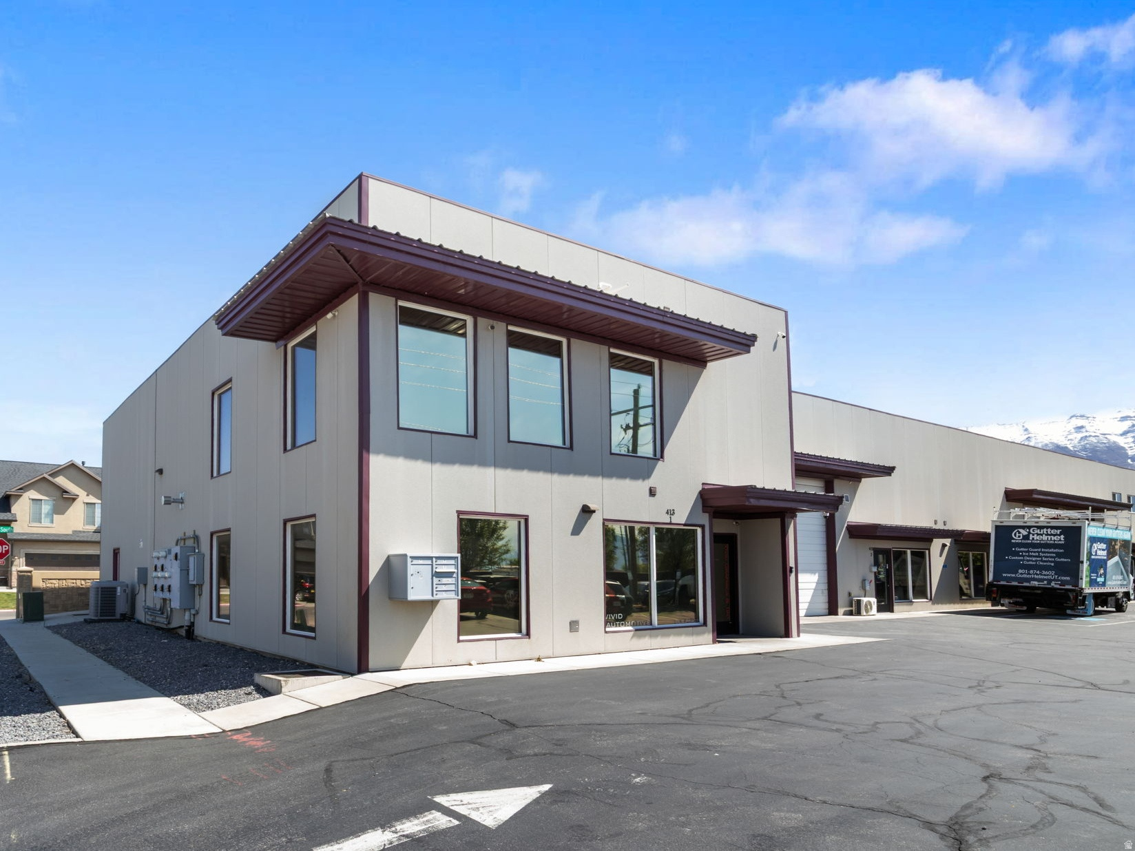 Flex unit in American Fork just off the 500 E exit with immediate I-15 access. Lease in place through June 2026 with no extension options, allowing for future owner occupancy. Functional layout includes a large reception area, one main-level private office, three upstairs offices, and two bathrooms. Equipped with 3-phase 200 amp and 240V power. Heated warehouse with 14' x 12' overhead door and 18' clear height. Flexible configuration supports a range of uses and can function as a single unit or be divided into two spaces.