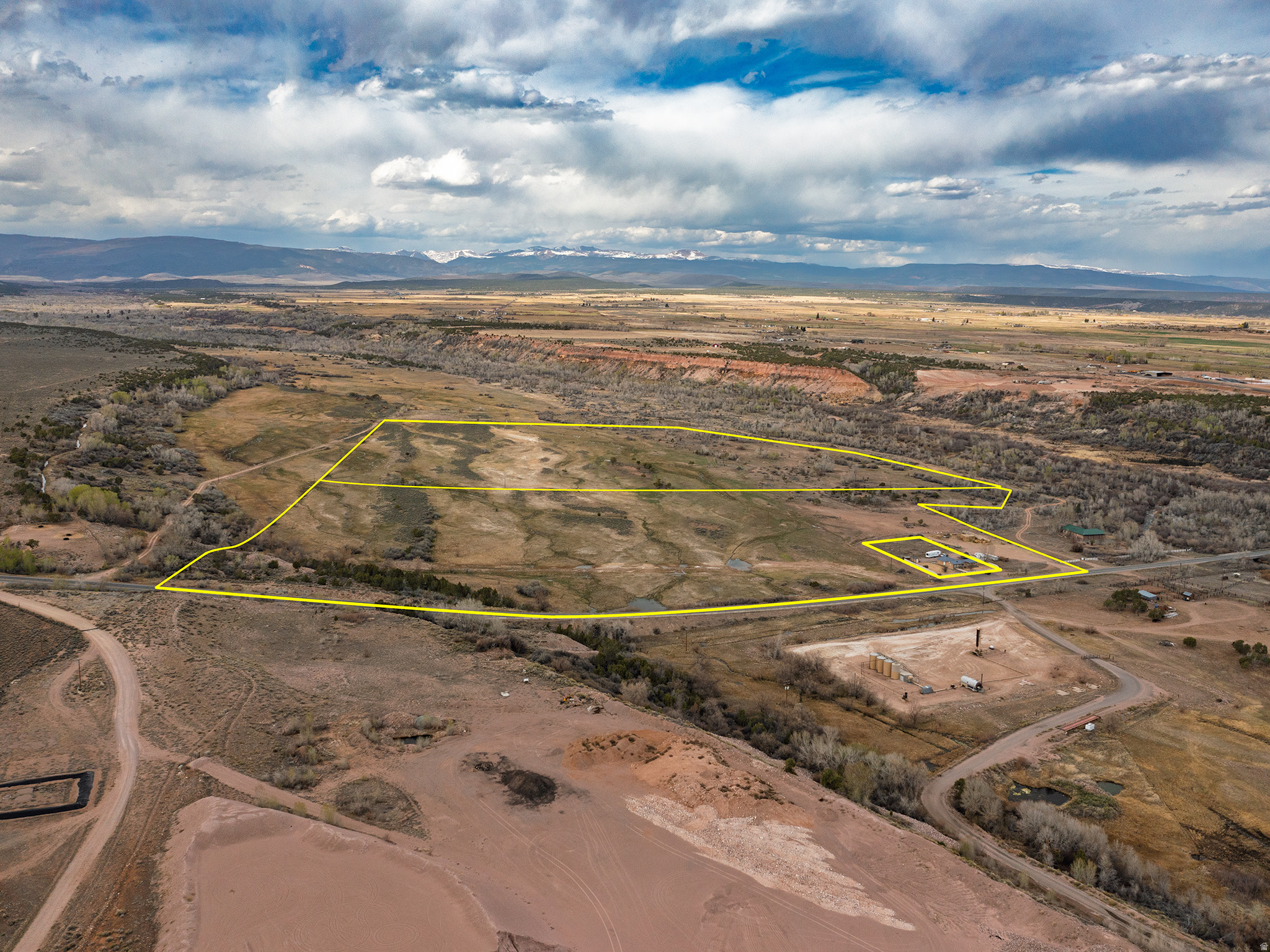 97.46 acres of quality pasture ground in Altamont. This property stays green with natural springs and runoff, making it a solid setup for grazing or horses. Fully fenced and ready to go. Enjoy wide open mountain and valley views with plenty of space to spread out. Easy south access right off Highway 87, with power close by for added convenience. Acreage like this doesn't come up often in the area. Currently zoned for Greenbelt. Buyer to pay roll back taxes if removed from Greenbelt status. No water shares available. Buyer to verify all information.