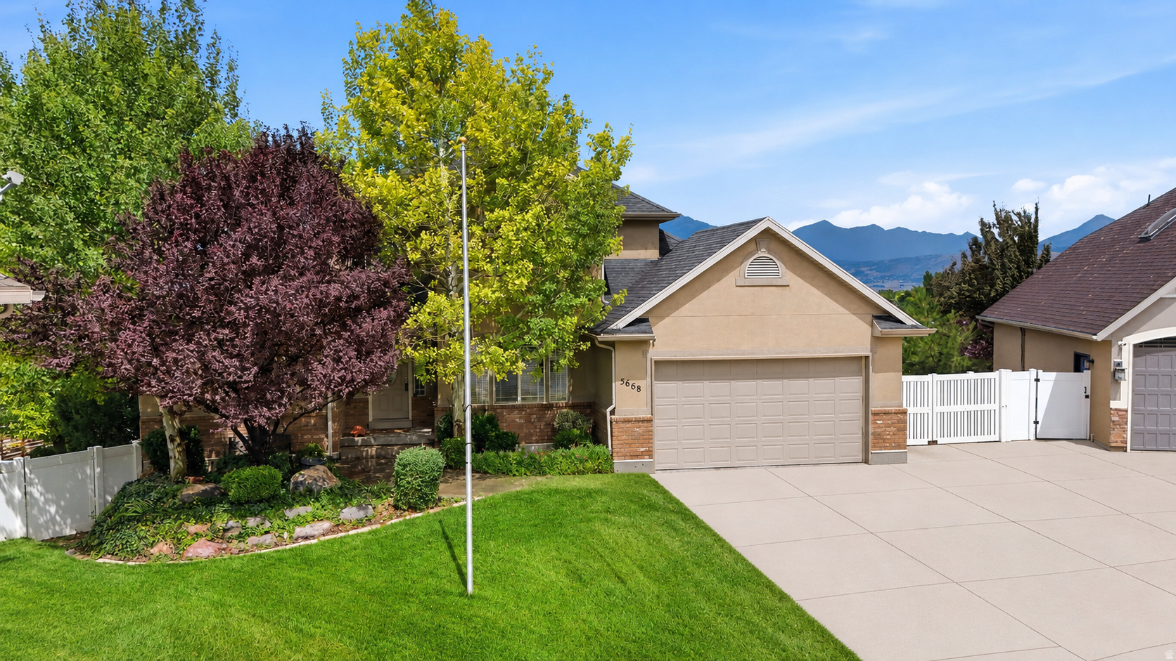 VIEWS! of the ENTIRE Salt Lake Valley!! Welcome to your Herriman dream home! Where space, storage, and functionality come together in one incredible property. From the moment you arrive, you'll appreciate everything this home has to offer, including massive garage space, endless storage, and thoughtful features that are hard to find. Inside, you'll find a big windows filled with natural light. The spacious living area flows seamlessly into the kitchen and dining space, creating the perfect layout for both everyday living and entertaining. The walk-out basement offers incredible flexibility with its own kitchen, making it ideal for multi-generational living, guests, or additional entertaining space. Outside is where this property truly shines. Enjoy a stunning, well-established garden, plenty of room to relax, and a large Connex storage container that's perfect for tools, seasonal items, hobbies, or equipment. Whether you have toys, trailers, a workshop, or simply need room for all your gear, you'll love the OVERSIZED garage(s) space and the abundance of storage throughout the property. If you've been searching for a home that combines beautiful living spaces with unmatched functionality, this Herriman gem is one you won't want to miss.