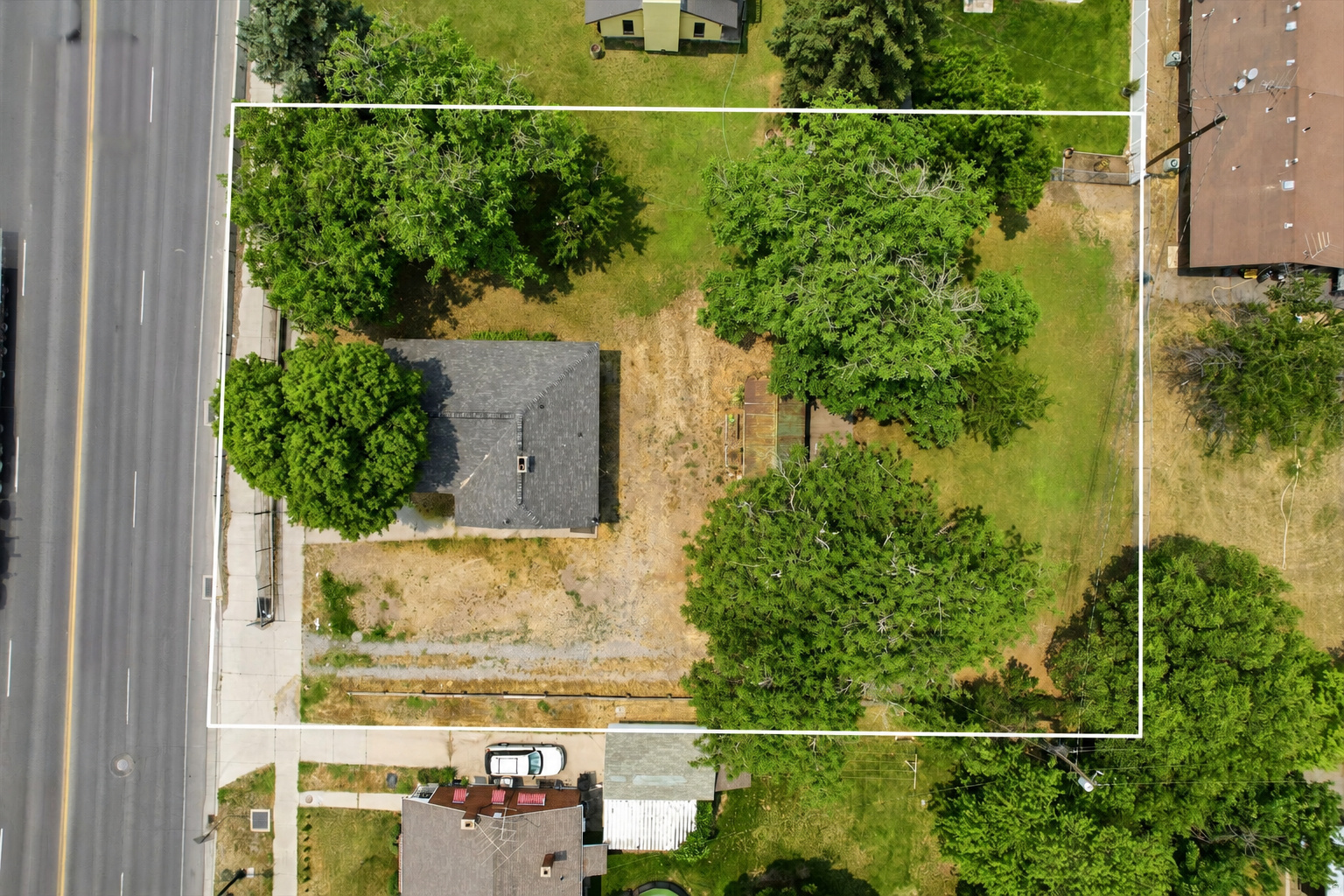 Opportunity awaits on this spacious .38-acre lot!  Whether you're an investor looking for your next project or a homeowner ready to roll up your sleeves, this property offers incredible potential to build equity and create something special.  The existing home is ready for updates and personal touches, making it the perfect canvas for your vision. With a generous lot size, there's plenty of room to expand the home, add outdoor living space, build a workshop, create the garden you've always wanted, or simply enjoy the extra elbow room.  The property also includes a storage shed and offers abundant parking for RVs, trailers, boats, and all your recreational toys. Mature shade trees provide character and a peaceful setting that's difficult to find.  If you've been searching for a property with room to grow, room to park, and endless possibilities, this is one you won't want to miss.  Bring your vision and unlock the potential!  **Home is being Sold As-Is. May not qualify for FHA.   Square footage figures are provided as a courtesy estimate only and were obtained from County Records.  Buyer is advised to obtain an independent measurement. Lot Lines are also an estimate, Buyer to verify.