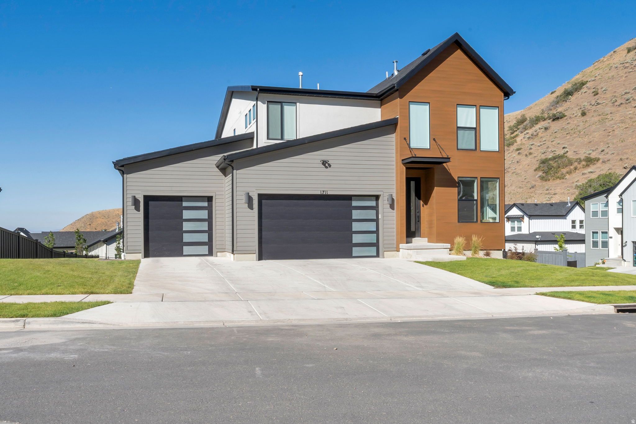 PRICED TO SELL! Exceptionally well taken care of- Lehi residence showcasing elegance, design, and craftsmanship at every turn. Perfectly located just 3 minutes from freeway access yet quietly tucked away, offering effortless access to anywhere you are looking to go. The home features many upscale products such as Gourmet kitchen with double ovens, gas cooktop with exterior vented hood, soft-close HDF cabinetry, designer finishes throughout with 6cm quartz countertops, premium tile and LVP flooring, and a striking linear fireplace, fully finished basement, 3-car garage, and full landscaping. This Corner lot captures stunning sunsets and is minutes from upscale shopping, dining, and theaters. No showings until Thursday, July 16.