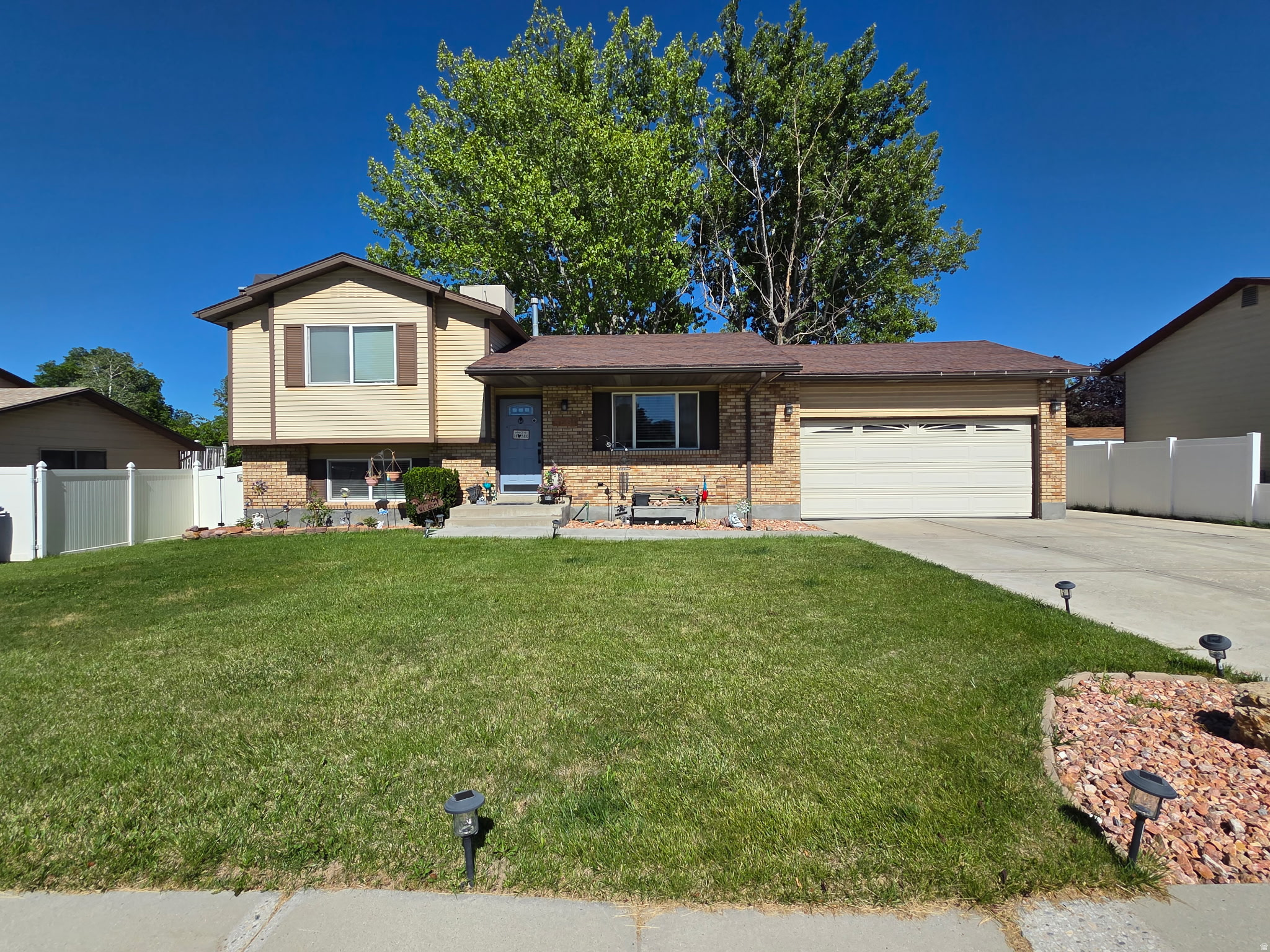 Conveniently located in the heart of Taylorsville, this well-maintained bi-level home offers the perfect combination of space, comfort, and accessibility. With 4 bedrooms, 1.5 bathrooms, and over 2,300 square feet of living space, there's plenty of room for family, guests, a home office, or hobbies.  Step outside to enjoy the large backyard complete with mature shade trees, a covered deck, and RV parking-ideal for entertaining, relaxing, or storing your toys. The attached heated 2-car garage provides additional convenience and storage.  Located within walking distance to parks, the library, community pool, schools, and places of worship, this home also offers quick access throughout the Salt Lake Valley with most destinations just 2025 minutes away. Nestled in a quiet, established neighborhood, this property is ready for its next chapter.  Buyer to verify all information.