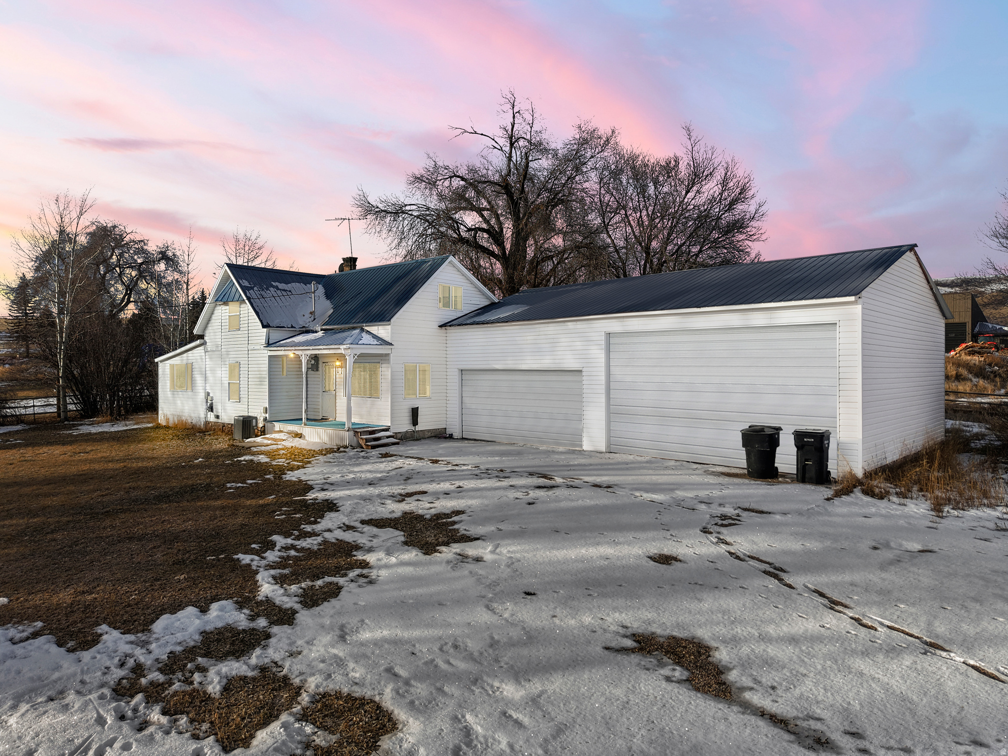 This 5 bedroom and 2 bathroom house is situated on a full acre in the peaceful town of Saint Charles. With 2,081 spacious square feet, this home offers room to spread out, both inside and out. The property includes an oversized garage with ample space for vehicles, toys, and storage. A large yard with mature trees creates a private, park-like setting ideal for outdoor gatherings and relaxation. Conveniently located just 5 minutes from Bear Lake North Beach Road, nearby shops, and watercraft rentals, and only 15 minutes from the Utah State Marina, this home offers easy access to all that Bear Lake has to offer. Outdoor enthusiasts will love the ability to ride ATVs or snowmobiles directly from the property up Green Canyon, connecting to hundreds of miles of mountain trails. This property is well suited for use as a short-term rental, a primary residence, or a second home, offering flexibility and strong appeal for both personal enjoyment and investment potential.