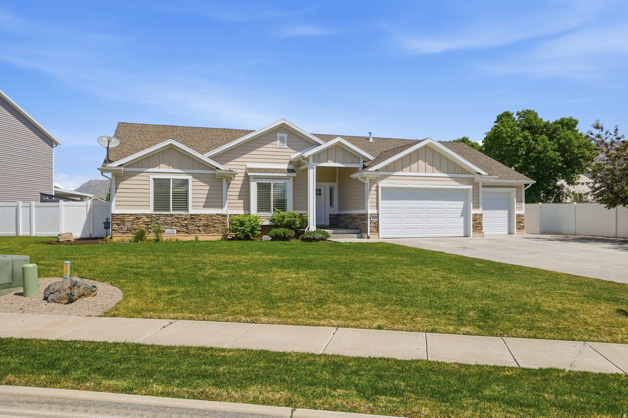 Looking for a custom-built, single-level home tucked away in a cul-de-sac with a heated true 4-car garage and fully fenced backyard? WELL HERE IT IS! This exceptionally well-cared-for home features a propane-heated garage on its own thermostat (with natural gas nearby for easy conversion if desired), updated LED lighting, and stunning polyaspartic garage floors - truly a garage lover's dream! Inside you'll find fresh paint, plantation shutters throughout, and a beautifully updated primary bathroom featuring brand-new tile and glass shower surrounds. Home features wifi smart switches on every light circuit and a smart home hub tablet mounted on the wall!  The fully landscaped yard includes secondary irrigation water, a full sprinkler system, RV parking, gates on both sides of the home for backyard access. As an added bonus, the lawn mower and snowblower are included with a full-price offer! This property checks all the boxes and won't last long. Schedule your showing today! Buyers to verify all information. Don't forget to check out the 3D and video tours!