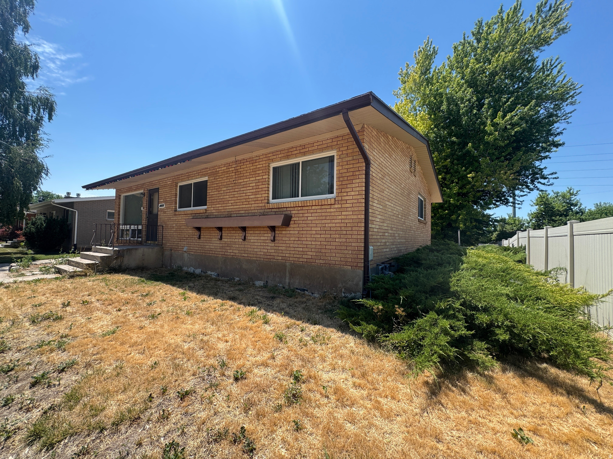 Established, quiet neighborhood surrounded by beautiful well care for homes with great views of Snow Basin Peak, Spacious family rooms on both levels - perfect for relaxing or entertaining. Large windows provide lots natural light, The sizable basement bedroom, previously used as the master suite, provides flexibility for your lifestyle needs. a secluded, peaceful backyard - an ideal space for unwinding or gathering with family and friends. Conveniently located just 10 minutes from Hill Air Force Base, Weber State University, and downtown Ogden, this home combines