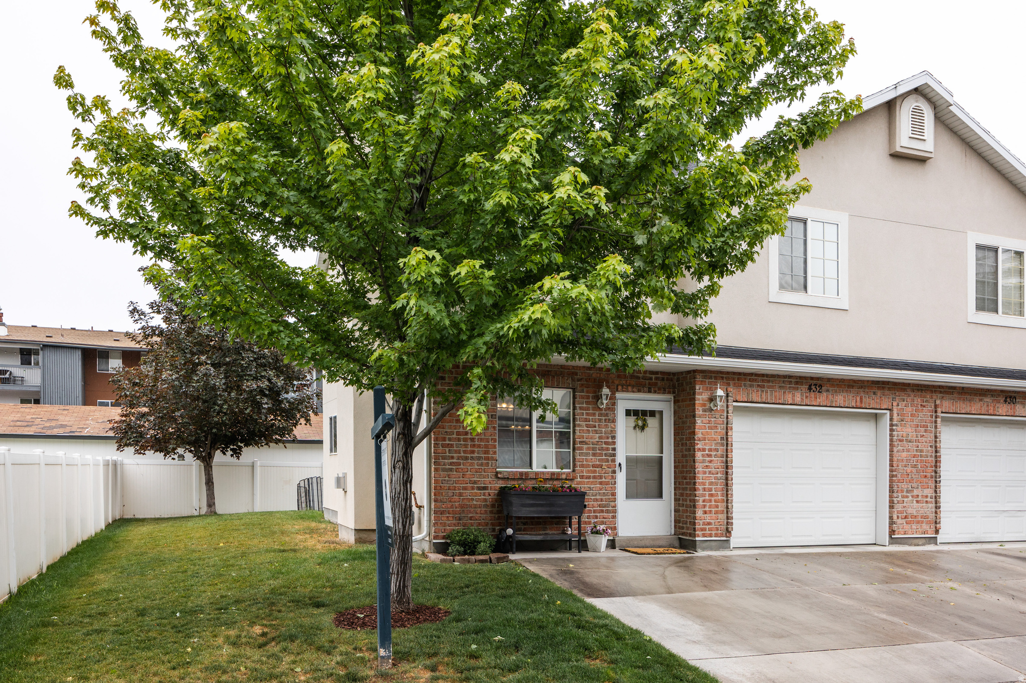 PROPERTY QUALIFIES FOR A COMMUNITY REINVESTMENT ACT LOAN WITH AS LITTLE AS 3% DOWN, LOWER INTEREST RATE, AND NO PMI. CONTACT AGENT FOR DETAILS. They don't make them like this anymore! Tucked at the end of a quiet, dead-end street inside the gated Oak Park community, this private row-end townhome offers the kind of space and livability that's hard to find. You're not squished on top of your neighbors, and your own fenced backyard is perfect for your garden, kids, or pets (zoomies encouraged). Step inside to a home designed for real life, where the kitchen opens to a real dining space, and the cozy living area is anchored by a gas fireplace. Thoughtful touches like one-way privacy windows and a main-level half bath keep your private spaces private. Upstairs, the vaulted primary suite feels like a retreat, complete with a walk-in closet and full en-suite bath. And yes, these bedrooms are actually bedroom-sized! Add in a deep garage, ample storage, and stainless steel appliances, and you've got a home that checks all the boxes. The Oak Park community is known for its mature trees, walkable sidewalks, open green space, and a playground that actually gets used, creating a neighborhood that feels established, cared for, and easy to love. HOA includes gated entry, security cameras, landscaping, snow removal, water, sewer, trash, and common area maintenance. Located at the crossroads of Millcreek, Murray, and South Salt Lake, you're minutes from I-15, Trader Joe's, Smith's, Millcreek Common, Granite Library, Murray Park & Aquatic Center, and Fashion Place Mall. Investor-friendly with typical rental rates of $2,000 to $2,500/month. Square footage figures are provided as a courtesy estimate only and were obtained from county records. Buyer is advised to obtain an independent measurement.
