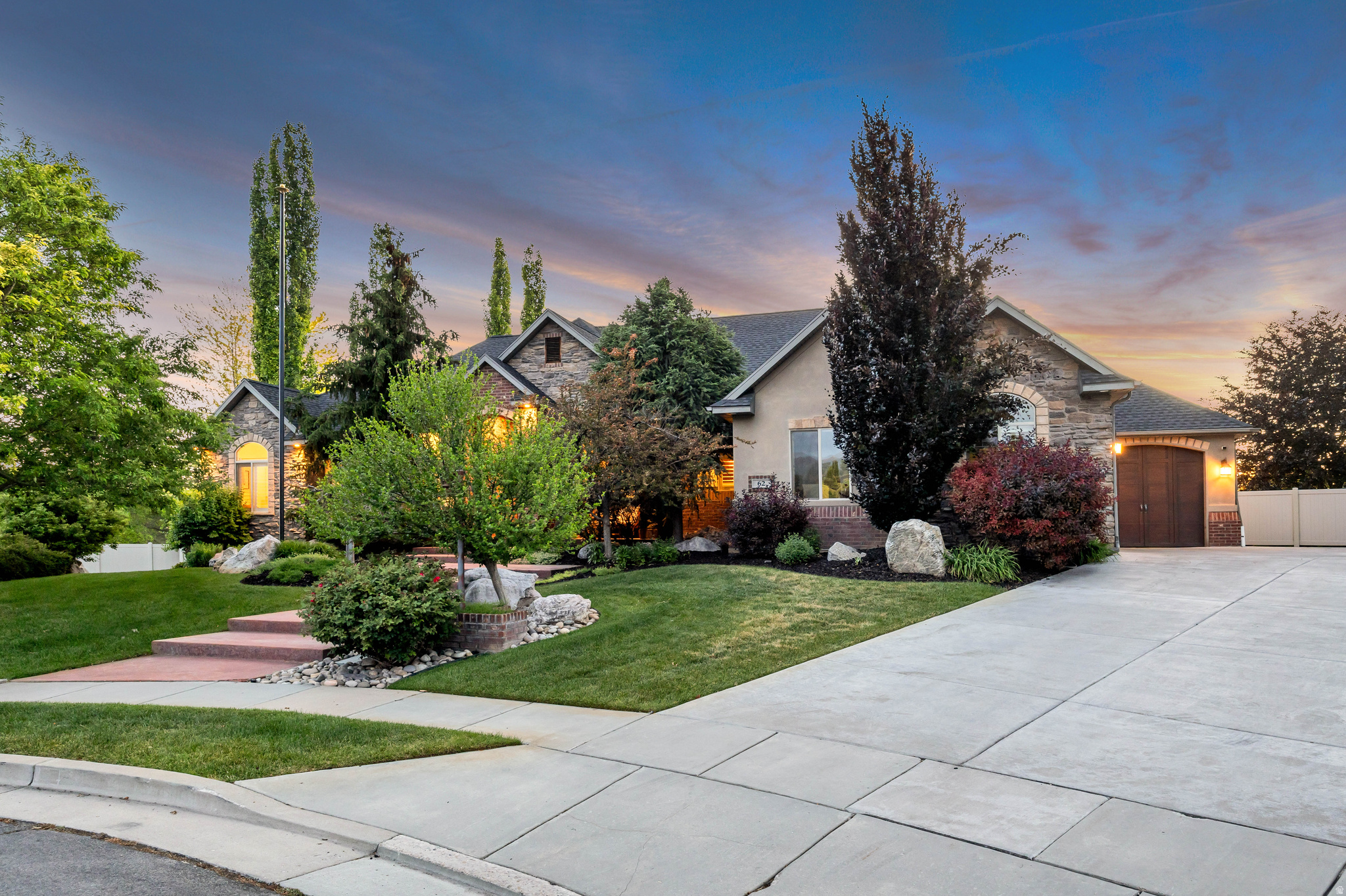 $100,00 PRICE REDUCTION! OPEN HOUSE CHANGED FROM TUESDAY, JUNE 9, 5-8 PM, TO SATURDAY, JUNE 13, 1-3 PM. Every once in a while, a home comes along that offers more than just a place to live, it offers a lifestyle. Nestled in a quiet cul-de-sac in west Kaysville in the highly sought after Mountain Vistas Neighborhood, this beautifully updated home backs directly to a large grassy commons area and walking path, creating a sense of privacy, space, and connection to the outdoors that is hard to find. Designed for both everyday living and unforgettable entertaining, the backyard is a true retreat featuring a sparkling pool, cozy fire pit, and a professional-quality pickleball/basketball court installed in 2022. Whether you're hosting summer gatherings, enjoying family game nights, or relaxing under the stars, this outdoor space was built to be enjoyed. Inside, the home offers generous living spaces and thoughtful upgrades throughout. The gourmet kitchen is a chef's dream, featuring a Viking professional double-oven range with six burners and a griddle, perfect for preparing everything from weeknight dinners to holiday feasts. The recently updated main floor showcases fresh finishes and modern touches, while much of the basement has been newly painted. Entertainment and wellness enthusiasts will love the dedicated theater room and private workout room, creating the ultimate at-home experience. The basement also offers more than 750 square feet of additional storage space. Technology and convenience come together with a Control 4 home automation system that integrates lighting, entertainment, climate, security, and communications. New owners have the opportunity to further modernize and expand the system to suit their needs. This south-facing property is ideally located near parks, trails, shopping, freeway access, and TRAX, offering both convenience and recreation right at your doorstep.  Over the past five years, the current owners have invested more than $150,000 in renovations and improvements, including a new roof installed in 2023 with premium 50-year shingles, providing lasting value and peace of mind. This is more than a home, it's a place to gather, play, entertain, and create lasting memories. Square footage figures are provided as a courtesy estimate only and were obtained from county records. Buyer is advised to obtain an independent measurement.
