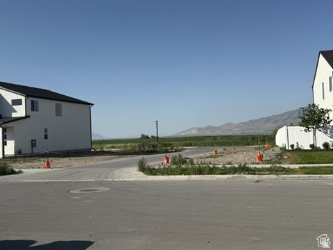 Looking for land with jaw-dropping views and long-term potential? This 0.17 acre lot in American Fork backs right up to Lakeshore Drive with unobstructed views of Utah Lake and the mountains-and guess what! No homes will likely ever block that view. All utilities are already in-you're ahead of the game. NO HOA, Build what you want (when the time comes). 112 feet deep, 71 feet wide-plenty of space to dream. Heads up: This lot is currently land-banked. It can't be built on until 1100 West and Lakeshore Drive punch through on the northwest side-but when that happens, this place becomes a total gem. You're getting a head start on a future build in one of Utah County's most scenic hidden corners. Buy it now, hold it, and enjoy peace of mind knowing the lake will always be your neighbor-not someone else's back porch. Awesome for building, investing, or just braggin' at a BBQ! All information, figures, and documentation provided as a courtesy, buyer to verify all information.