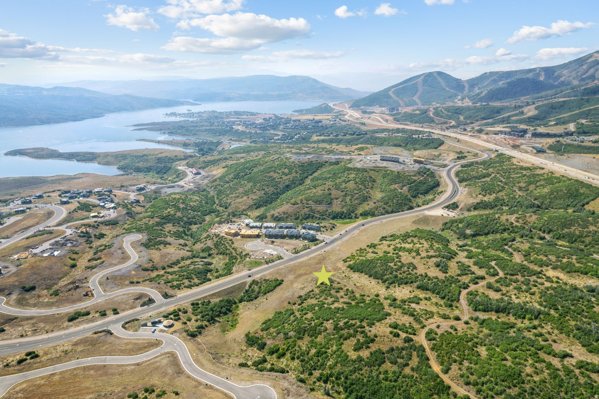 8.90 acres, East Park lots 250, 256, 257. Located between Deer Valley East Village and the Jordanelle Reservoir, west of Skyridge, directly off Jordanelle Parkway. 12 JSSD water ERUs.   1. Lot 257 Parcel 00-0000-7935 at 4.08 acres with 6 JSSD water ERUs,  2. Lot 256 Parcel 00-0000-7927 at 3.86 acres with 5 JSSD water ERUs, and  3. Lot 250 Parcel 00-0000-7869 at .95 acres with 1 JSSD water ERU  Buyer responsible for independent verification of all property data. Listing Broker/Agent not liable for inaccuracies.