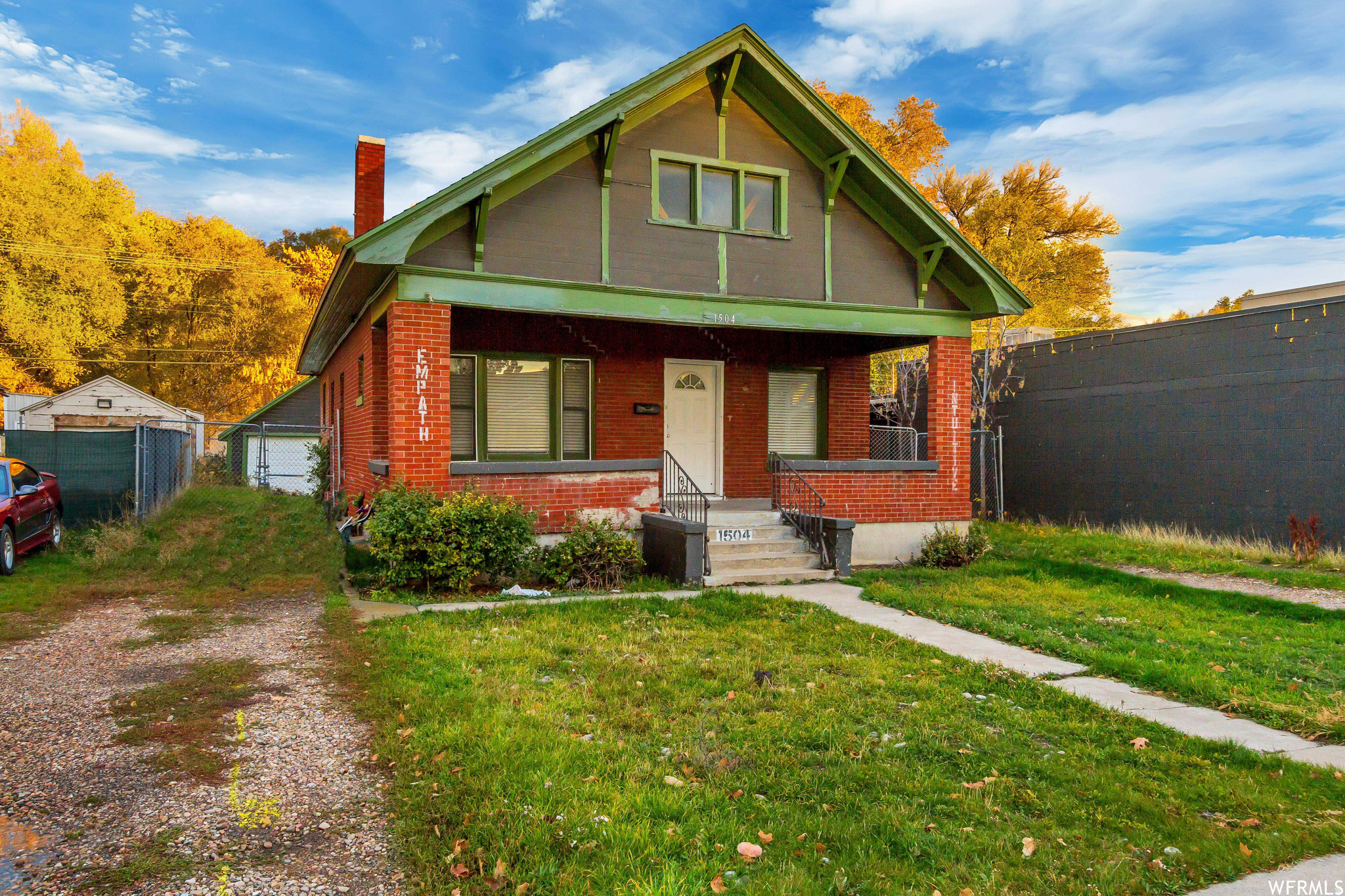Don't miss seeing this updated home in the heart of Ogden. The property features a large backyard and a separate garage with a workbench area. The home features a large kitchen-dining-family great room. Create a mother-in-law or ADU in the basement accessible via the separate entrance located on the back of the house. Newer furnace, A/C, plumbing, etc. This FHA mortgage has a very low assumable interest rate if interested; see Agent Remarks for more details. Welcome home!