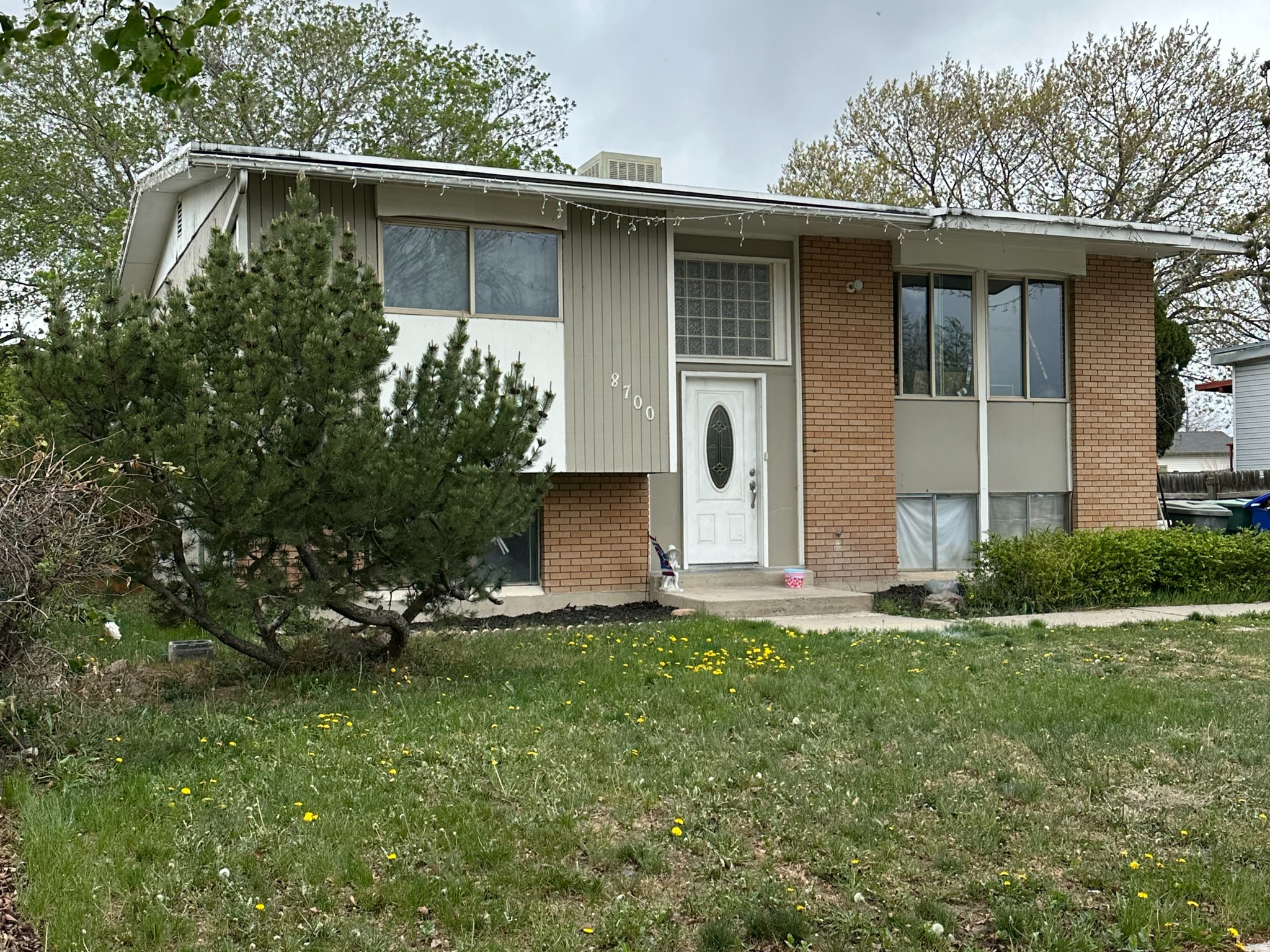 This West Jordan 4-bedroom and 2-bath home is conveniently located near Jordan Landing and other shopping areas. It has potential for an ADU or mother-in-law suite with a walk-out basement. The spacious layout features a large family room with big windows for plenty of natural light. The master bedroom includes two closets. With so much potential, you can truly make it your own. The home has new paint and is ready for a new buyer. Square footage figures are provided as a courtesy estimate only and were obtained from Salt Lake County Assessor's. Buyer is advised to obtain an independent measurement.