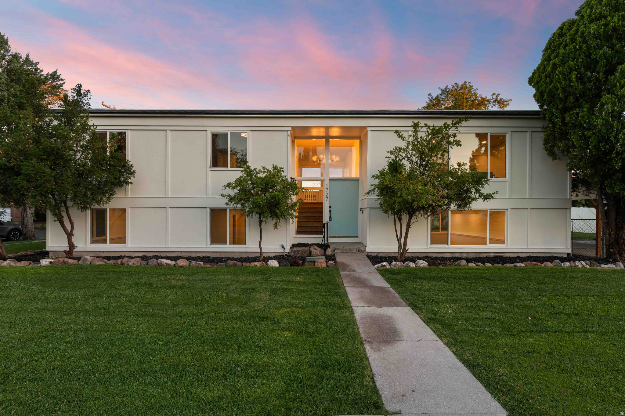Come make this beautiful home yours.  From the moment you enter the home, you will be greeted by bright, inviting spaces that create a sense of peace, excitement, and possibility. Enjoy a brand-new remodeled home, with every detail professionally with you in mind. As soon as you walk in you will feel as if you were walking into a home design magazine. You will notice features like: Brand-new stainless-steel appliances, gas stove, quarts countertops, brand new flooring and carpet, fully tile-in bathrooms, laundry room with washer and dryer included, 5 comfortable bedrooms and to top it all, brand new professionally design landscaping with fully automatic sprinklers system.  The home is located close to the golf course, in a quiet neighborhood and just 4 to 9 minutes away from the airport. Do not let them tell you, come check it out by yourself and tell me how you feel in your future home.