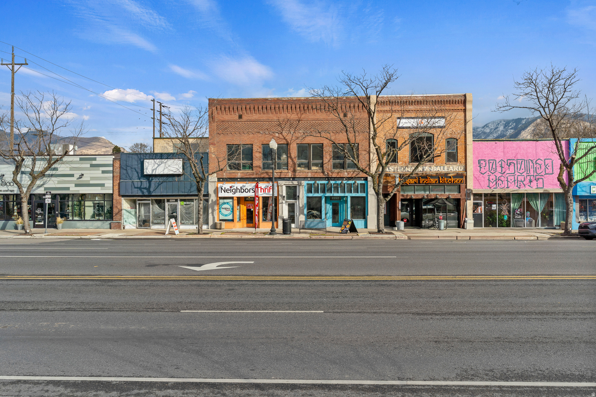 Two buildings offered together present an exceptional investment opportunity in the heart of historic downtown Ogden. This partially restored historic property sits along busy Washington Boulevard and combines charm, functionality, and prime visibility. The 2208 building features ground-level space with a large open floor plan, expansive storefront windows, rear alley access, and an upstairs level with original brick walls and abundant natural light. Recently remodeled, the 2210 building space has been recently customized for current tenant Neighbors Thrift, and includes a private office, additional storage, a break room with kitchenette, and basement storage. The 2212 building space offers ground-level retail/office space, also positioned for maximum exposure on Washington Boulevard. The open layout, high ceilings, and large storefront windows create a bright, welcoming setting ideal for retail or professional use. An exceptionally clean basement provides additional storage. A bonus second floor space sits above the 2210 and 2212 buildings and boasts original brick walls, hardwood floors, high ceilings, and abundant natural light, creating an inviting and character-rich environment. With private access from Washington Blvd, this space is ideally situated for office or residential use. Located in vibrant downtown Ogden, the property is surrounded by an eclectic mix of local and regional businesses, restaurants, hotels, and entertainment destinations including The Junction, Megaplex Theatres, Fat Cats, Salomon Center, iFLY, Treehouse Children's Museum, and the iconic Ogden Utah Temple. Zoned Ogden City C-ENT and HUBZone Certified, this rare two-building portfolio presents a prime opportunity for investors or owner-users seeking a presence in one of Northern Utah's most dynamic commercial corridors. Weber County Parcel #01-034-0079 includes 2208, 2210, and 2212 Washington Blvd. Please DO NOT disturb tenant in 2210.