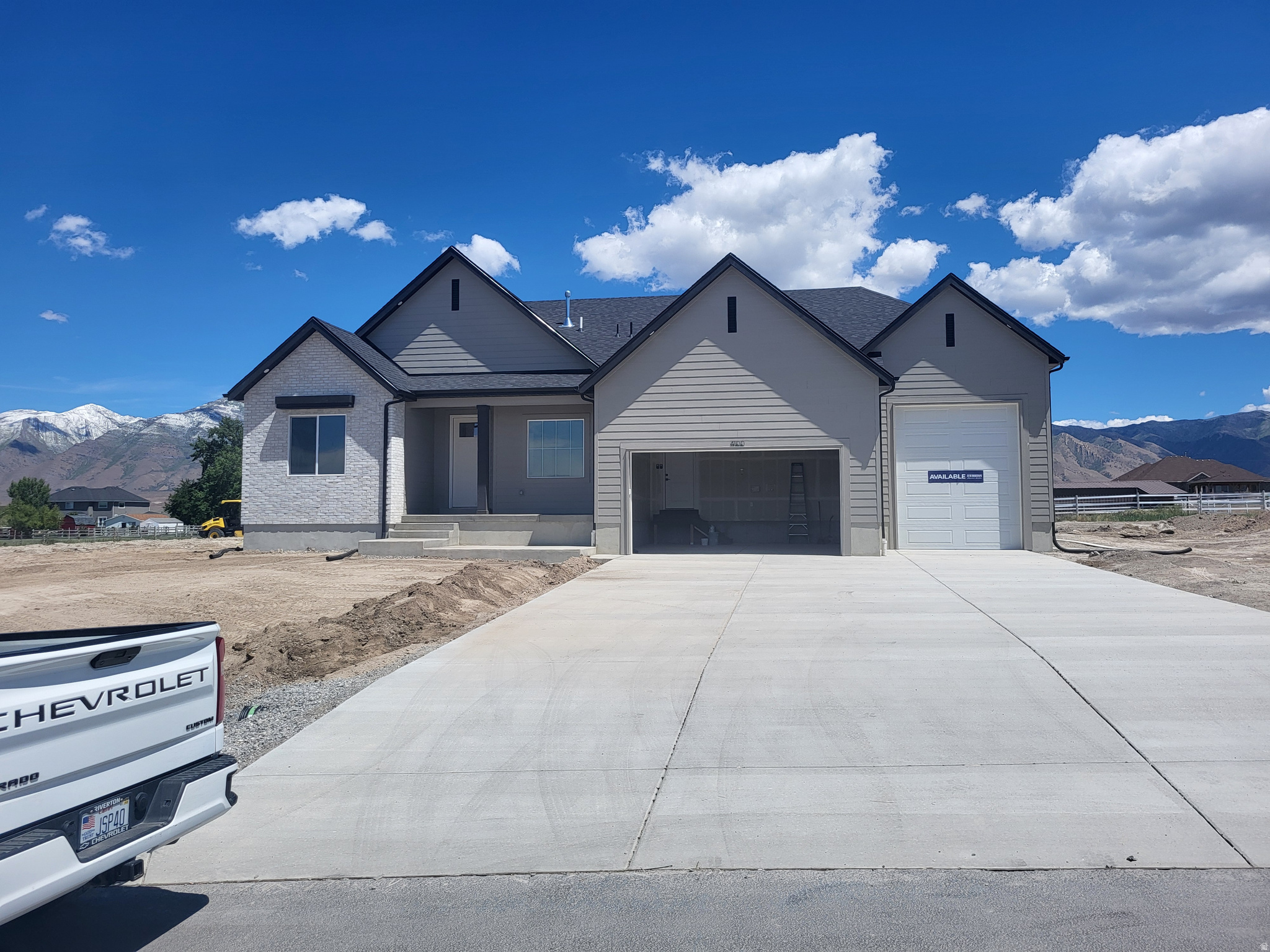 RILEY PARK IN ERDA 1 ACRE LOTS. By appointment only.  This home is under construction for a JUNE completion. This amazing OAKLEY floorplan sits on 1 full acre in Erda Utah. The main floor owner's suite has it all: tray ceiling, large walk-in closet, double undercounter sinks, soaker tub and oversized shower. Get cozy in the large family room around the fireplace. The open concept kitchen includes a large island for food prep/counter seating, a large walk-in pantry, kitchen with gas cooktop, 42" upper cabinets w/ crown molding, 30" Single sink, upgraded cabinet with dovetail, soft-close features. Laminate floor throughout the kitchen, dining, & family room. Quartz countertop in kitchen and bathrooms, Powder room located next to the garage entry and mud room bench. Stair railing with newel posts. Home includes unfinished basement with 9' foundation walls, room for a large family room, 3 additional bedrooms, a bathroom, and under porch storage. 95% efficient furnaces, 50-gallon water heater, & plumbed for a soft-water system. 3-car RV garage with 12' x 10' door and extra space on the side of the garage to add an RV pad. Ask me about our generous home warranties, active radon Mitigation System, and Smart Home Package, which is included in this home. The actual home may differ in color, material, and/or options. Pictures are of a finished home of the same floorplan, and the available home may contain different options, upgrades, and exterior color and/or elevation style. Square footage figures are provided as a courtesy estimate only and were obtained from building plans. No representation or warranties are made regarding school districts and assignments; please conduct your own investigation regarding current/future school boundaries.