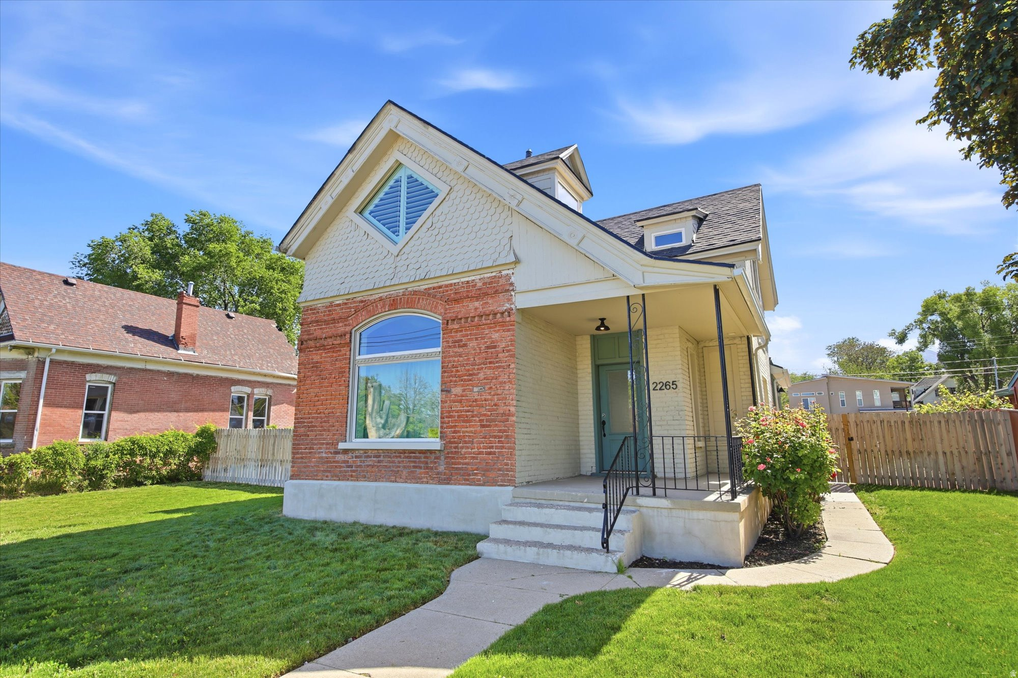 Rare 4BR/3.5BA Sugar House gem perfectly blends classic charm with modern luxury. Enjoy peace of mind with a 2021 renovation featuring new electrical, improved foundation, and sleek amenities. The functional floor plan is designed for effortless living. Step outside to great curb appeal with a lush front lawn, sprinklers, and roses. The spacious, fully fenced backyard is a blank canvas for your dream. Plenty of parking with back alley access, 2 covered spaces and at least 4 uncovered spots. Minutes to U of U, golf, skiing, and downtown SLC. Square footage figures are provided as a courtesy estimate only and were obtained from County Records.  Buyer is advised to obtain an independent measurement.