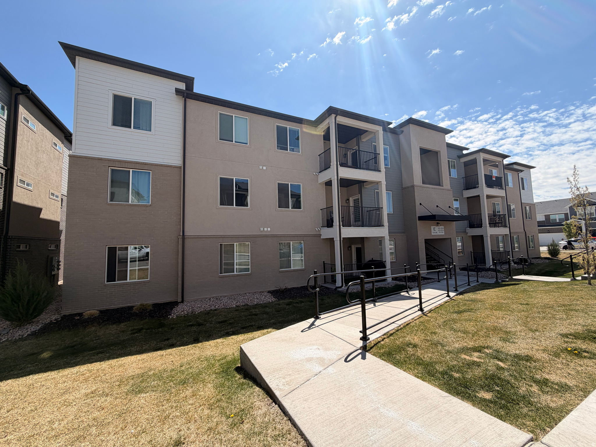 Only first-floor condo in the community with direct garage access into the home! Enjoy Herriman-area living at an affordable price. Ideally located between Mountain View Corridor and Bangerter Highway, this well-maintained, move-in-ready condo offers convenient access to shopping, dining, parks, and major commuting routes. Just minutes from Costco, Cinemark, Walmart, Nike, and the new Trader Joe's and Target currently under construction. Priced under $390,000, this home presents an excellent opportunity for both homeowners and investors seeking value, convenience, and location. Additional features include a 240V outlet for EV charging and easy, low-maintenance living.