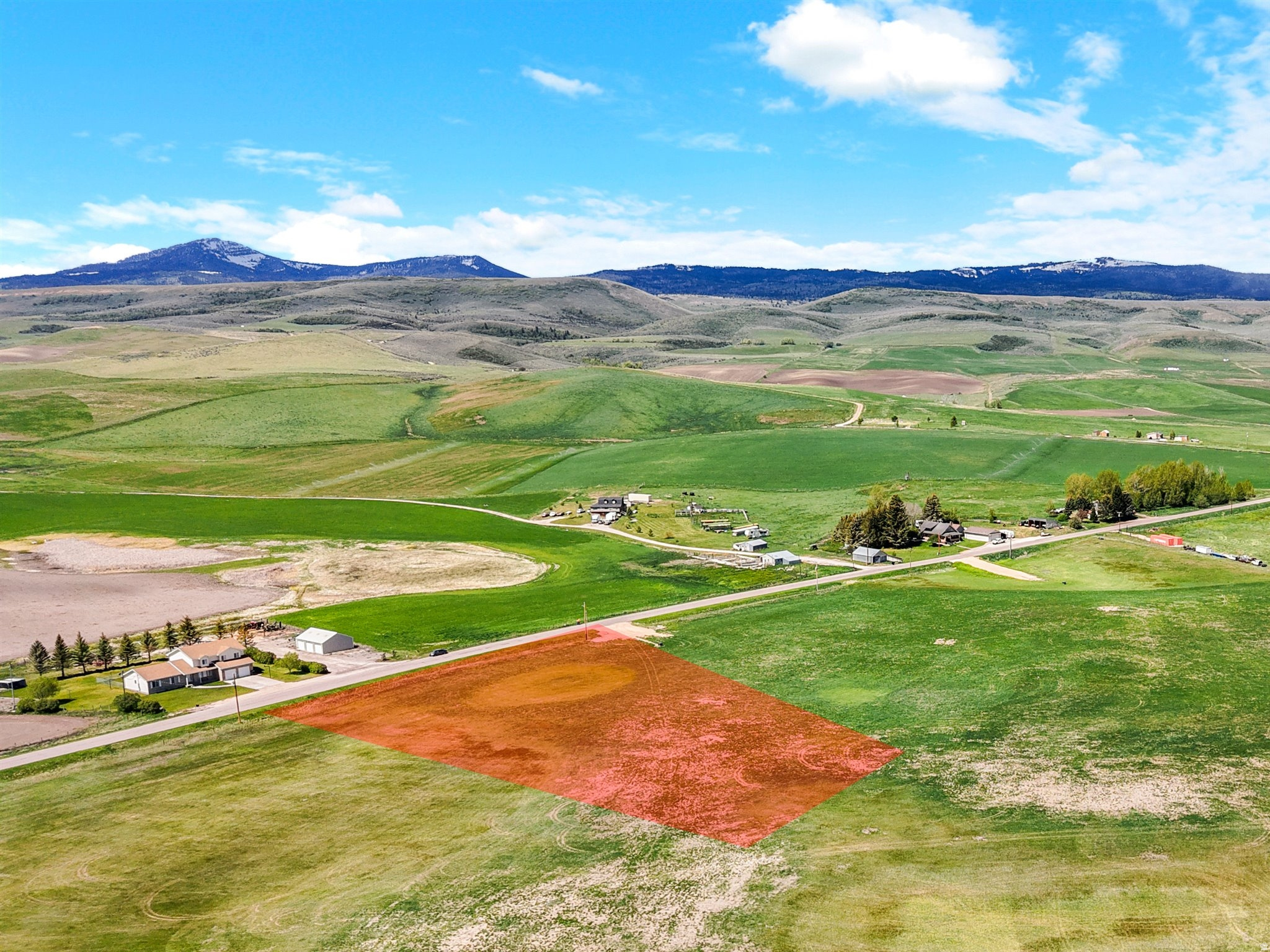 2.5 acres in Bear Lake Valley, Idaho. Nestled along quiet and rural Lanark Road, Lot 4 of Baer Acre Farms offers flat, usable land in one of Southeast Idaho's most sought-after recreational areas. Enjoy the perfect balance of privacy and convenience - just 5 minutes to both Paris and Montpelier for shopping, dining, schools, and everyday errands, while still feeling tucked away from the hustle and bustle. This spacious parcel is ready for your vision with an improved approach already completed, power stubbed to the lot, and fiber optic conduit installed. Whether you're dreaming of a year-round residence, vacation getaway, hobby farm, or private retreat, this property provides the flexibility and space to make it happen. Outdoor enthusiasts will love the unmatched location. Only 10 minutes Mill Canyon to access National Forest. Just 15 minutes from Bear Lake's famous North Beach and only 25 minutes to Garden City, you'll have quick access to boating, fishing, ATV trails, snowmobiling, hiking, and endless year-round recreation.