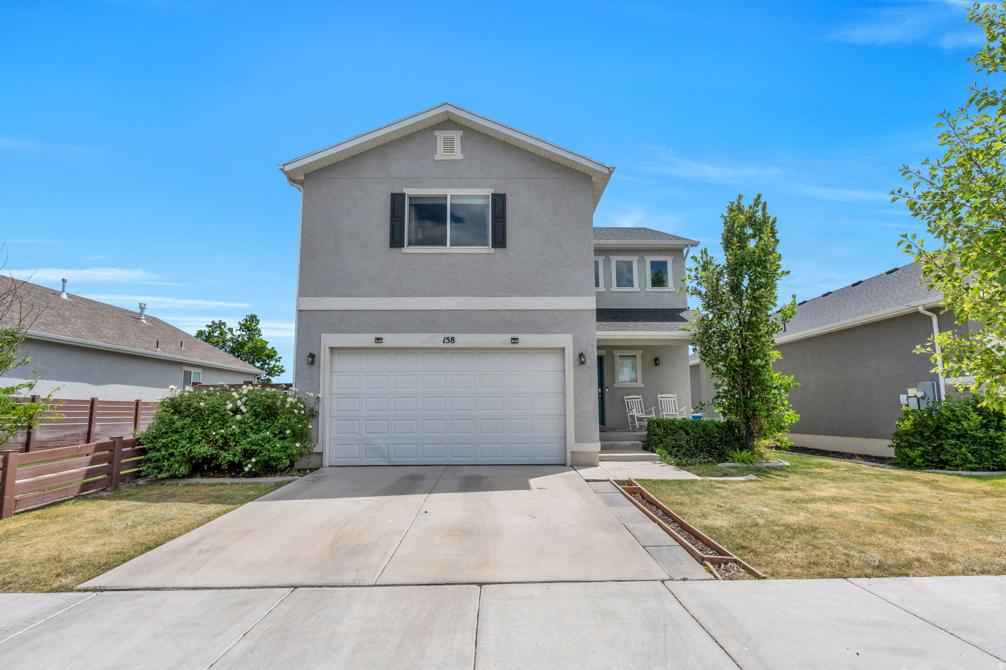 Across the street the whole open field and Vineyard Trail are yours - no neighbors behind you, just unobstructed views and a deck with a pergola made for slow mornings and long evenings. In a community where the park behind you doubles as your extended backyard, this two-story in Cascade at Waters Edge gives you room to build a life without a huge backyard to chain you to the weekend. Inside, the open-concept main floor pulls in light through oversized windows and sliding glass doors, flowing from the living area into a kitchen built for real use - granite counters, wood cabinetry, a walk-in pantry, and an island with seating where everyone ends up anyway. Upstairs, a second living area anchors the primary suite, where dual sinks, a separate tub and shower, a walk-in closet, and mountain views start and end the day. Two more bedrooms and a full bath round out the level. Downstairs, a fully finished basement with its own living area, kitchenette, bedroom, and bath flexes for guests, in-laws, or multigenerational living. Nearby: a clubhouse, pool, community trails, and recreation along Utah Lake - with I-15, shopping, and dining minutes away, and Utah City rising right next door as the future center of Utah County. Measurements provided as a courtesy only, buyer to verify all info.