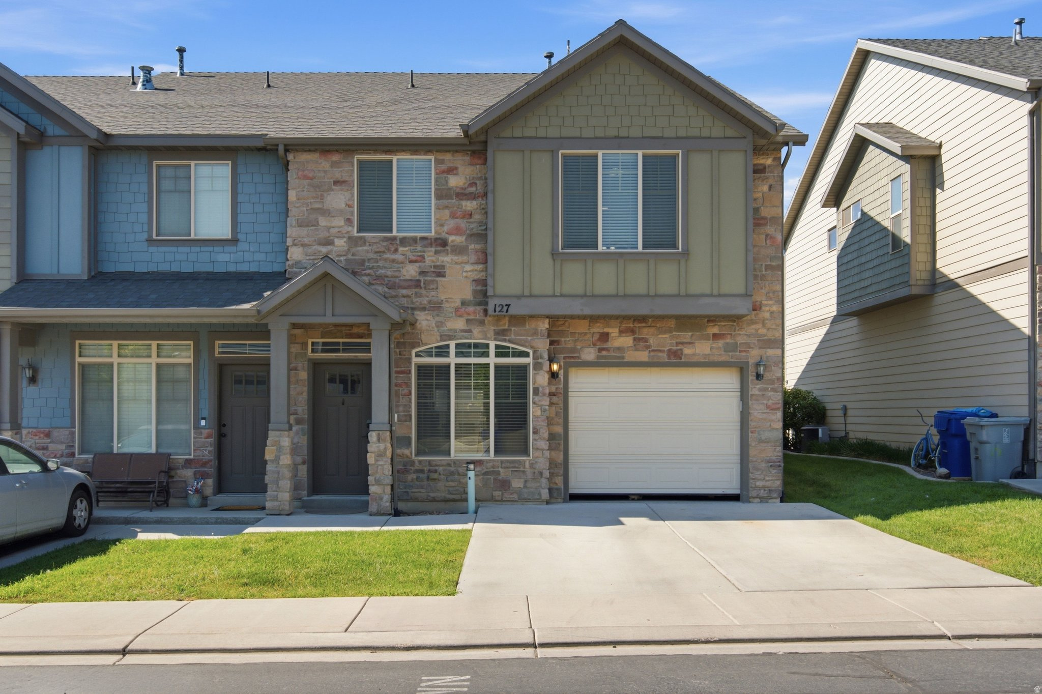 Beautiful end-unit townhome in a prime Saratoga Springs location near the Jordan River, with convenient access to shopping, dining, parks, and entertainment. Features newer HVAC system (2025), newer carpet (2023), spacious family rooms on both levels, and an open-concept kitchen with a large island, granite countertops, stainless steel appliances, and adjoining dining area. The primary suite offers vaulted ceilings and a walk-in closet. Enjoy your evenings outdoors on your fully fenced private patio. Move-in ready and a must-see!