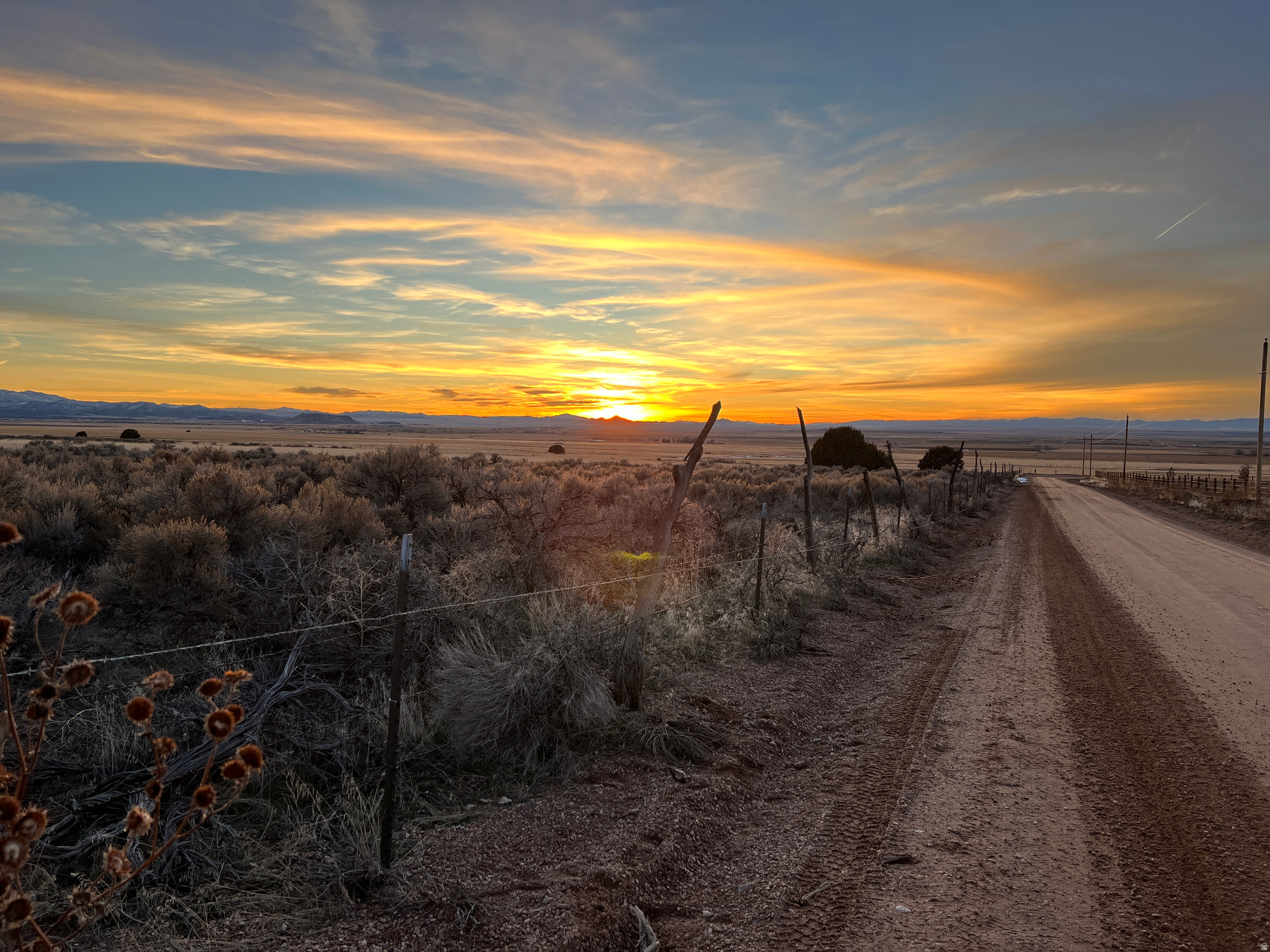 Ride your horse from your home across the street to BLM and Forest Service land. Quiet location south and east of meadow on a dead end road. Gentle slope on the east bench provides a great view for Millard County's epic sunsets. Parcel is being split from existing 40 acre piece and will be the east half and consists of Juniper trees and sage brush. Zoning is Ag-20 allowing one home to be built if water and power are connected. Water rights available for purchase. Power is accessible from the road on the North property line boundary.