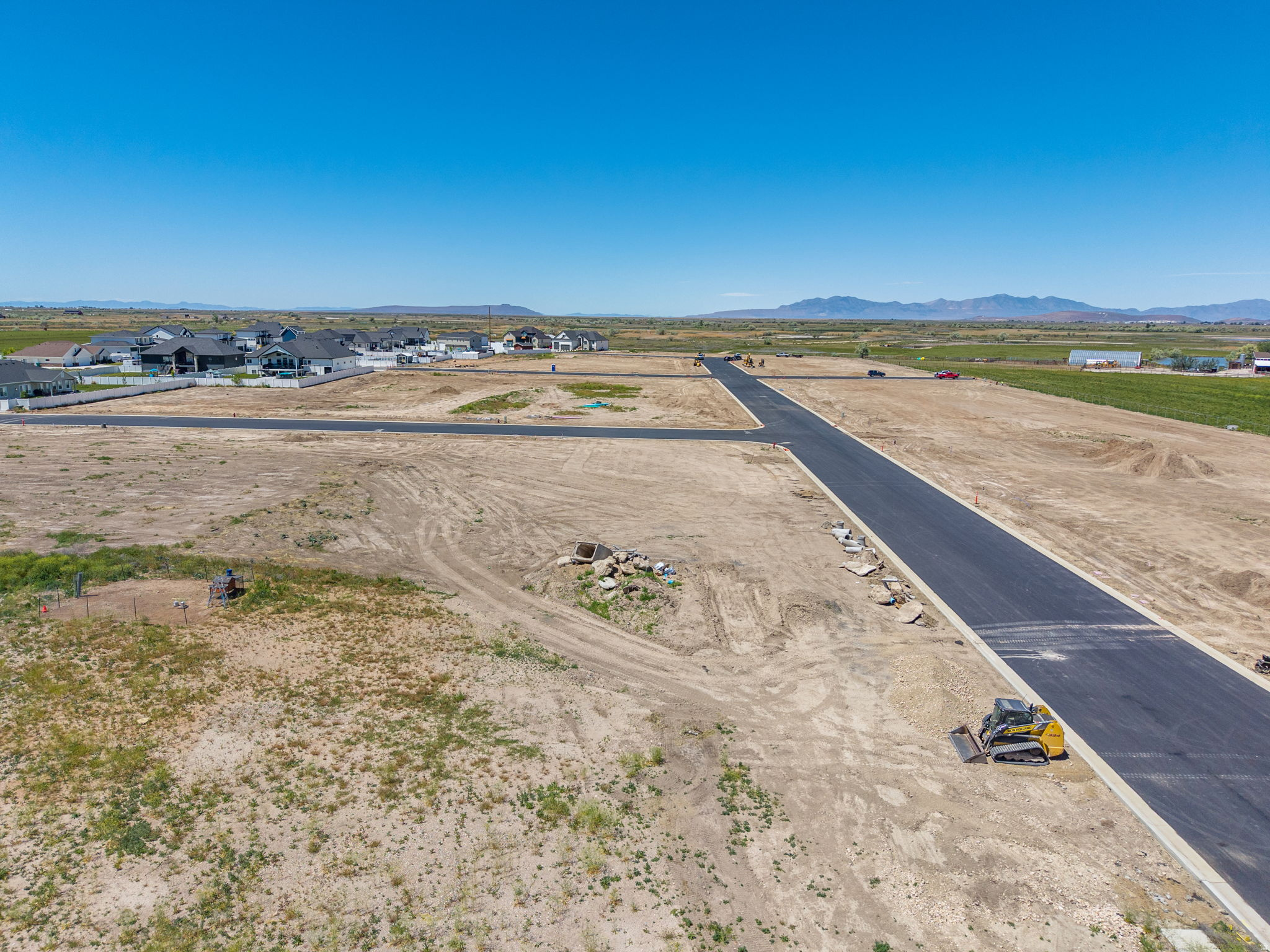 Lot 222 - Rawson Ranch - Phase 2 is a 28-lot subdivision in the peaceful countryside of Hooper, Utah, offering large, near half-acre building sites that are hard to find these days! These lots have stunning mountain views and ample space for a comfortable family home, barn, or shop, all without an HOA. You can choose your own builder, or we can happily recommend several reputable options. There are multiple lots currently for sale, please contact the listing agent to confirm which ones are available. If you value flexibility, space, and a serene rural setting within easy reach of amenities, Rawson Ranch is a great option! Reach out to discuss available lots, and start planning your custom home!