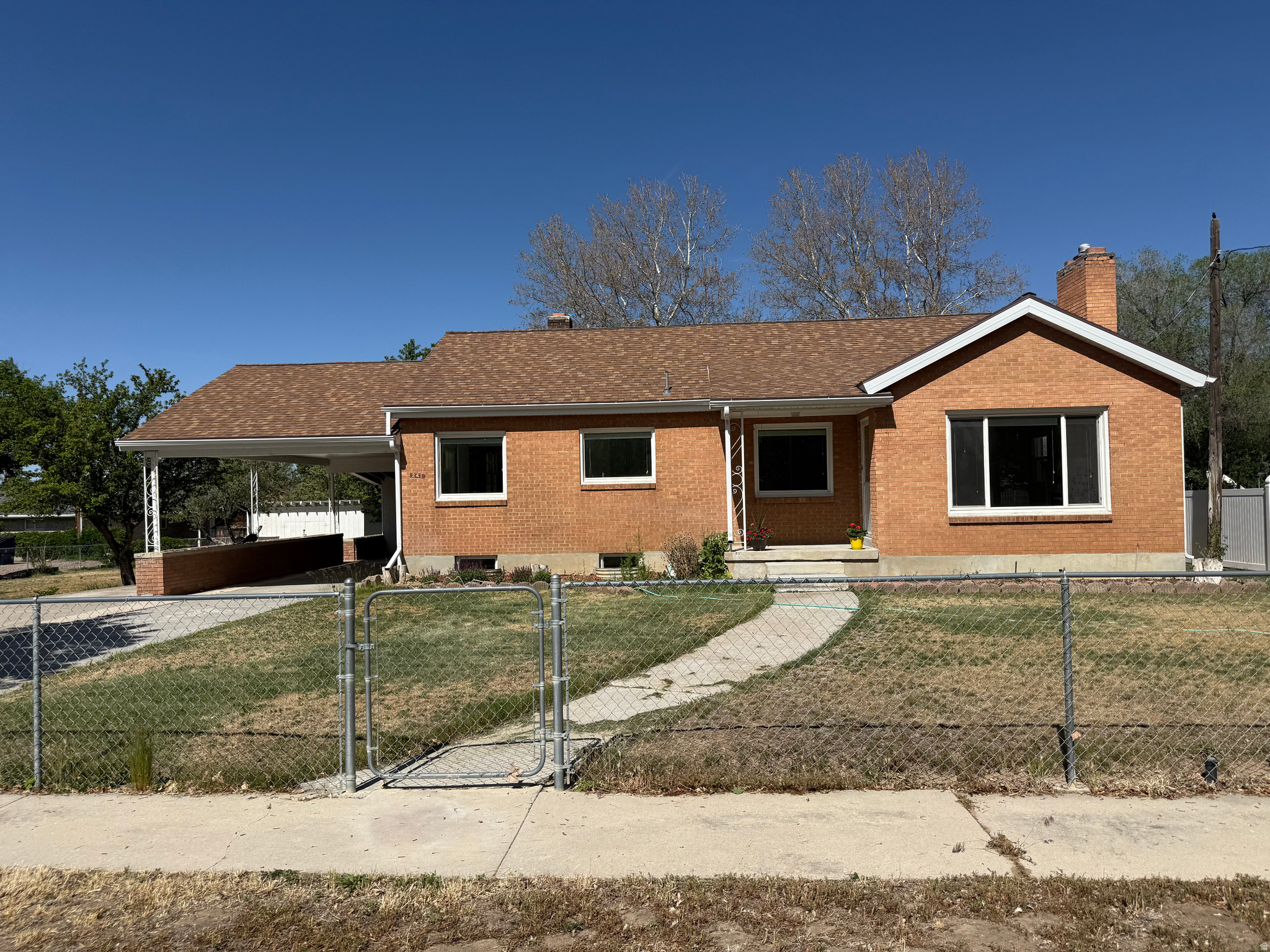 Welcome to this beautifully updated brick home in a desirable location! This move-in-ready property has been extensively remodeled with fresh paint, new flooring, a fully updated kitchen and bathrooms featuring modern finishes throughout. Home also has new furnace, rain gutters, windows, roof and soffit for added comfort and peace of mind. The home features an automated sprinkler and drip system to keep the landscaping lush with minimal maintenance. Enjoy the privacy of the fully fenced yard, complete with mature trees and fruit trees that provide shade and seasonal harvests. Thoughtfully updated inside and out, this home blends classic charm with modern convenience. Agent related to seller. Square footage figures are provided as a courtesy estimate only and were obtained from county.  Buyer is advised to obtain an independent measurement. Buyer and buyers agent/broker to verify all information.