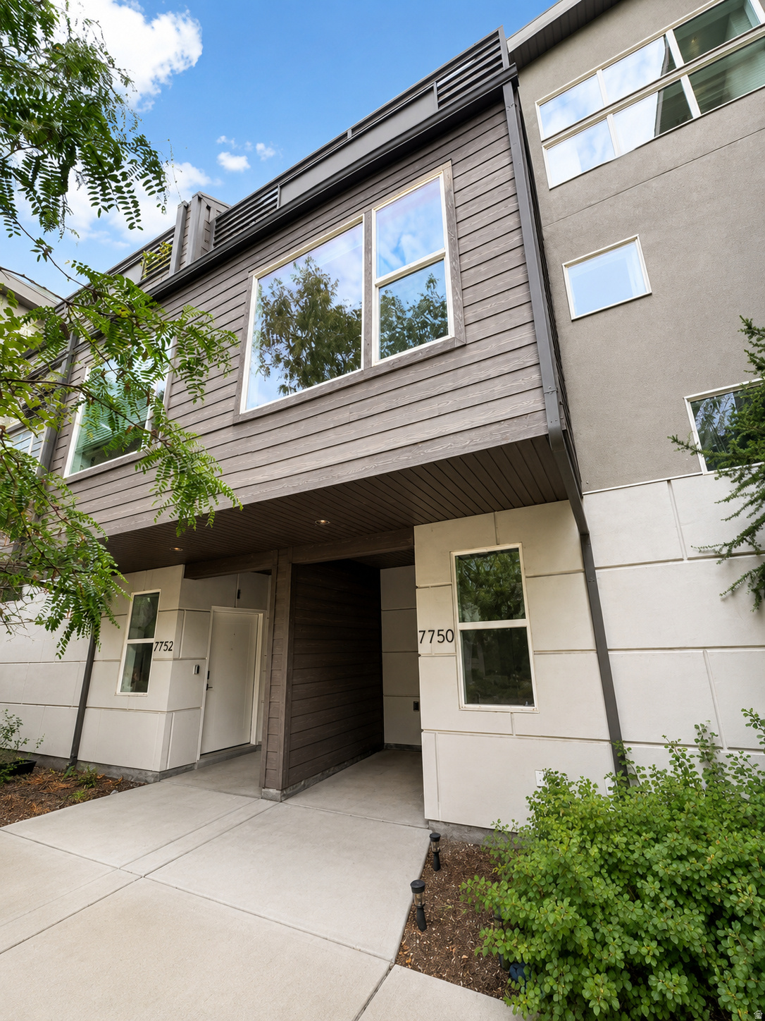 Welcome to this beautiful townhome located in the Rooftops at 78 Hundred Townhomes community in Midvale. This well-designed home offers 2 bedrooms, 2 bathrooms, and approximately 1,410 square feet of living space. Features include an updated kitchen, vaulted ceilings, central air, a spacious primary suite with separate tub/shower, walk-in closet, in-unit laundry, private deck, and a 2-car built-in garage. Enjoy a convenient Midvale location with community amenities including park/playground access. The HOA also includes insurance paid. This property is currently tenant occupied, with possession available upon expiration of the current lease on 11/17/2026. Please do not disturb tenants. Buyer and buyer's agent to verify all information, including square footage, HOA, utilities, schools, and lease/possession terms.