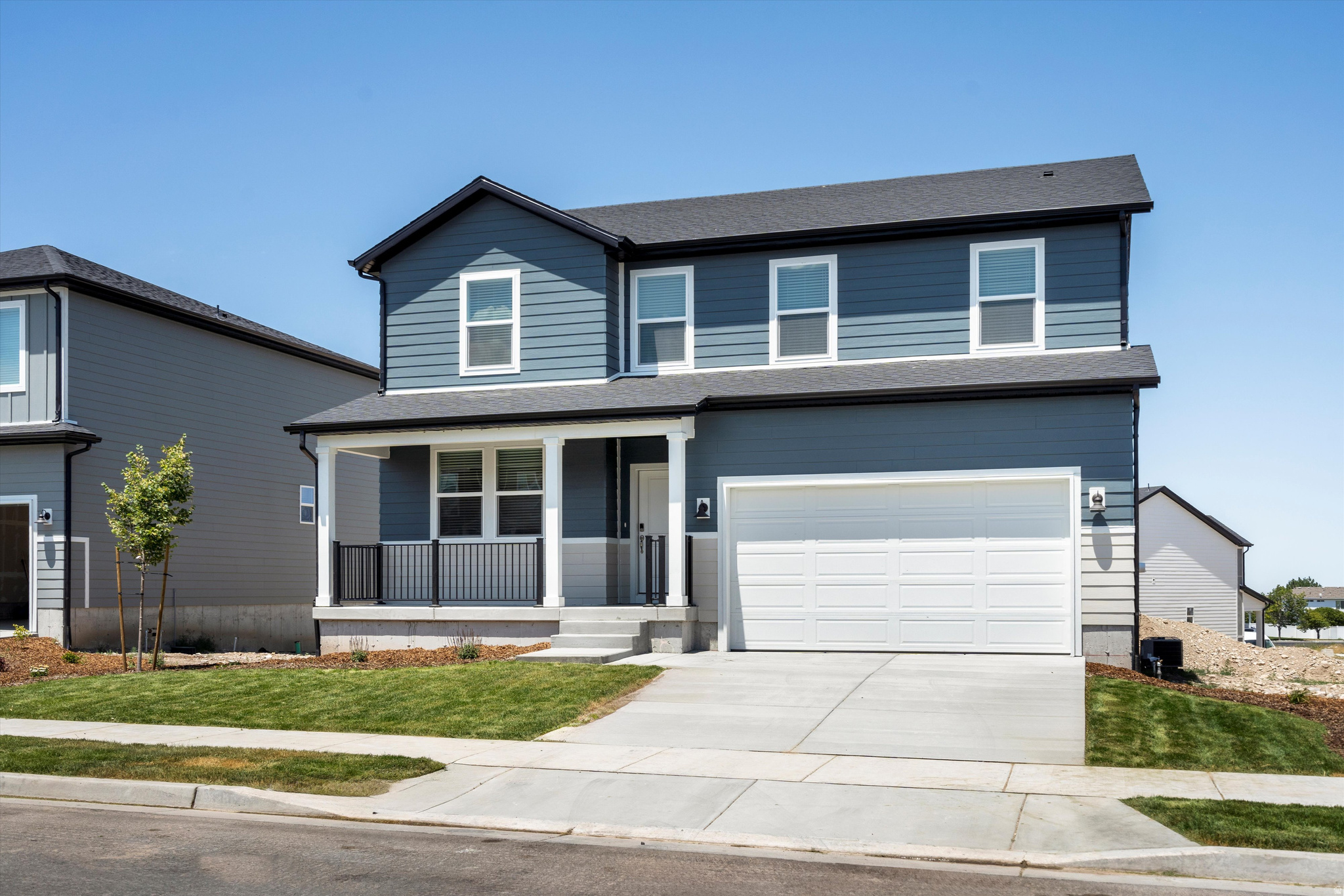 This five bedroom home has plenty of space for both entertaining and relaxing. Enjoy an open concept kitchen and living area downstairs, and unwind in the upstairs primary suite. Unfinished basement included. Move in ready with a washer, dryer, fridge and blinds throughout !Total home approx. sq. ft. 4,067.