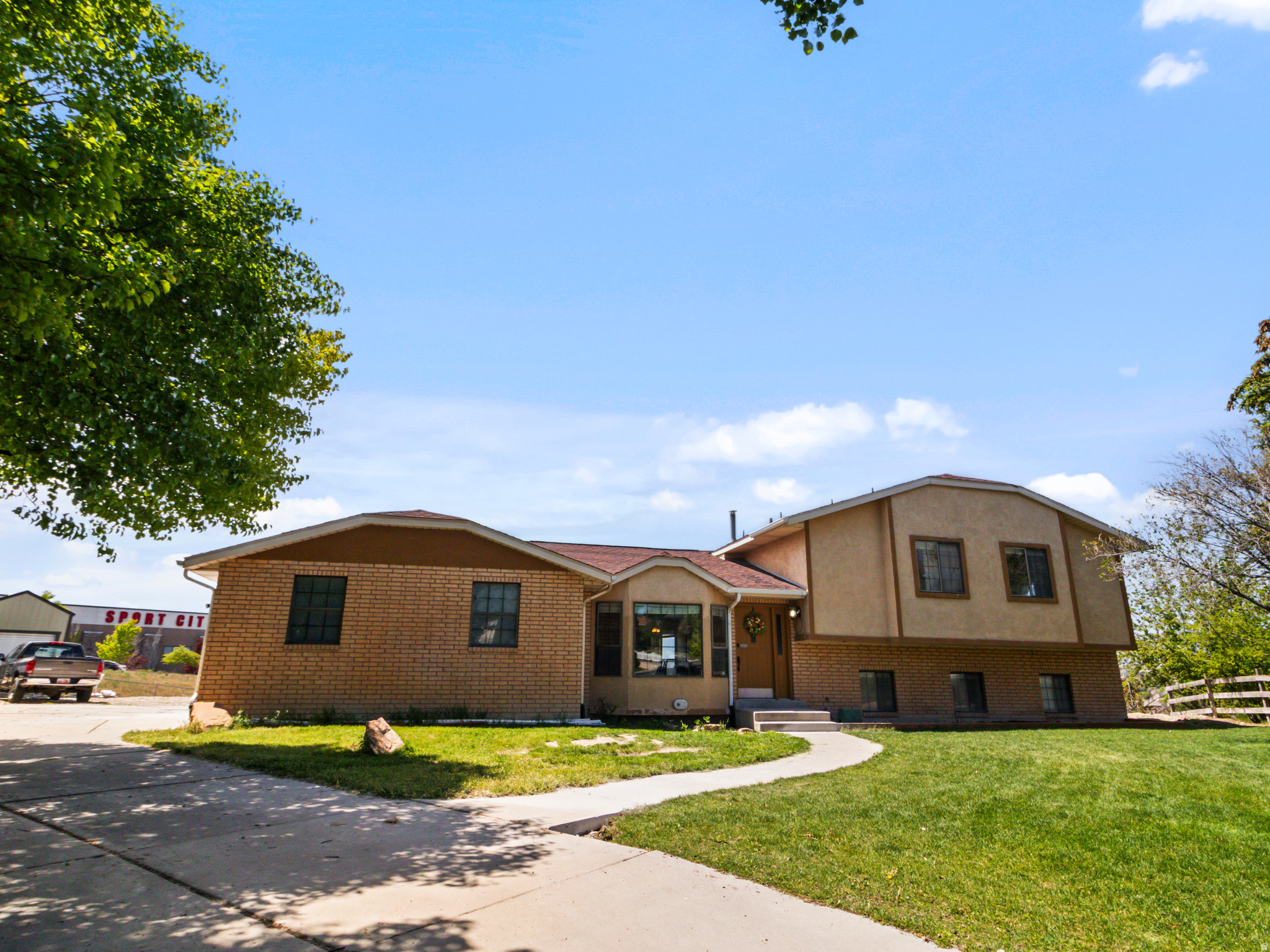 Open concept home with lots of space for gathering. Cul de Sac living in a great neighborhood! $10,000 carpet concession!  5 bedrooms + office/flex room, 3 full bathrooms, 2,940 sq ft across 4 levels  0.61-acre lot with RV/trailer parking spots, large driveway, 2-car garage  New HVAC (2022), new front lawn & sprinklers (2025)  Open-concept kitchen and main living area, great for entertaining  Exterior deck with two cement patios  Jordan River Parkway trail access from the neighborhood entrance  Fireworks views across the Salt Lake Valley from the property  Location can't be beat - Quick I-15 access to Salt lake or Provo - 25 mins to the airport  South Jordan Elementary  South Jordan Middle  Bingham High School