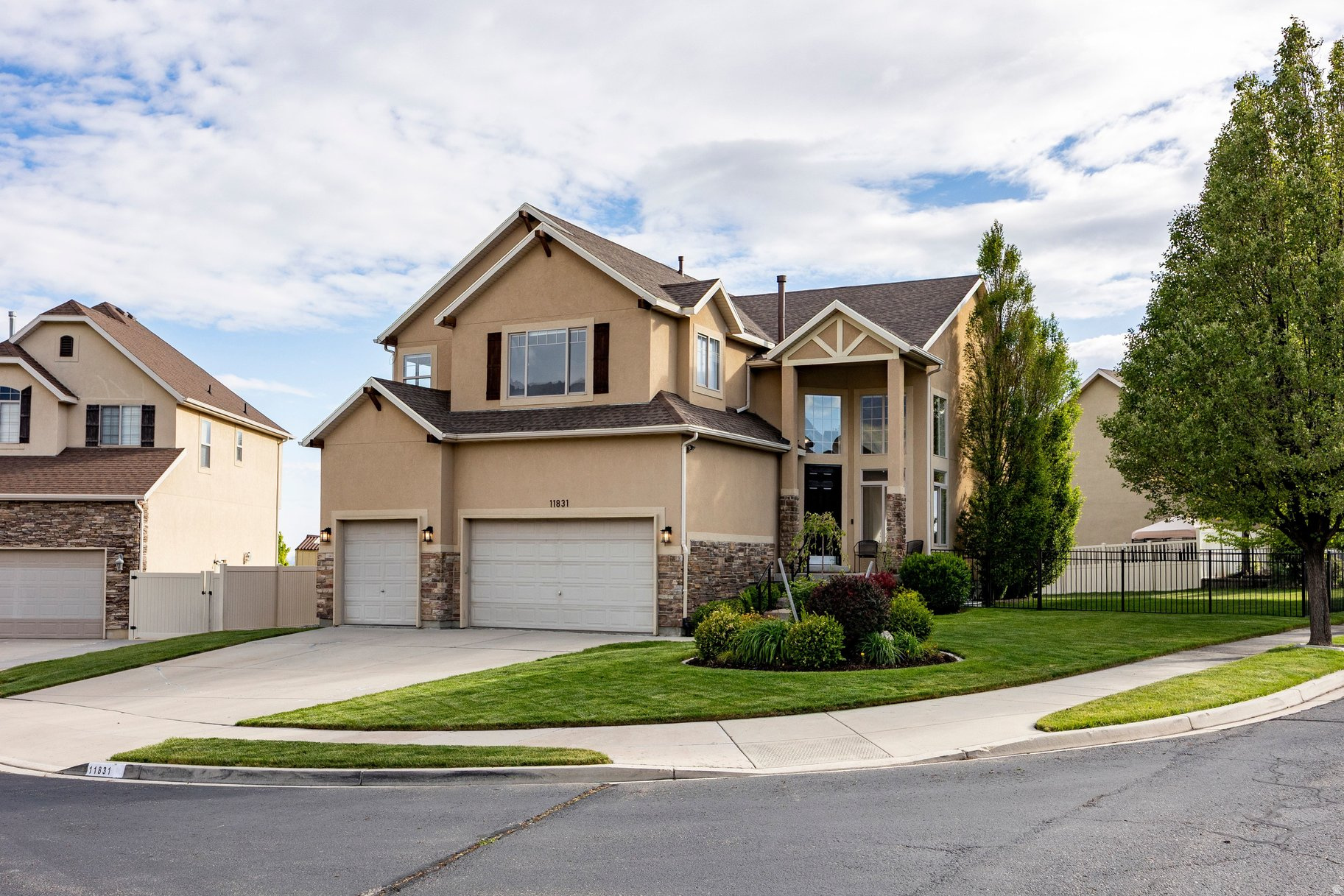Welcome to this fantastic family home tucked away on a quiet cul-de-sac in the highly desirable city of Highland! Sitting on a large corner lot with beautiful mountain and Utah Lake views, this home has tons of space, natural light, and room for everyone to spread out.  You'll love the grand entry and formal living room with soaring two-story ceilings that make the home feel bright and open from the moment you walk in. The rest of the main level features 9-foot ceilings, a formal dining room, and a flexible den currently being used as a piano room. There's also a mudroom plumbed for a second main-level laundry room if you'd like that option.  The heart of the home is the spacious great room with the kitchen, breakfast nook, and cozy family room all connected together. The stone gas fireplace creates the perfect gathering space, while the kitchen features granite countertops, stainless steel appliances, gas range, and laminate flooring. Just off the kitchen is an enormous maintenance-free TimberTech deck with plenty of room for entertaining, BBQs, or simply enjoying the views. The fully fenced backyard is ideal for kids and pets.  Upstairs you'll find an extra-wide hallway open to the main level below, along with 4 bedrooms and 2 bathrooms. The oversized primary suite features vaulted ceilings, separate his-and-her closets, and a spacious bathroom with double sinks, separate tub and shower, plus a cosmetic vanity. One of the secondary bedrooms is extra large with vaulted ceilings as well. Every bedroom has amazing views of the mountains, Utah Lake, or both.  The basement has fresh paint and brand-new carpet and offers even more living space with a huge family room, 2 additional bedrooms, an updated full bathroom, and a large laundry room.  Additional highlights include new carpet throughout the entire home, a new roof replaced in 2023, tons of storage, a 3-car garage, RV parking, and an unbeatable location close to everything Highland has to offer. This is the kind of home your family can grow into and enjoy for years to come.