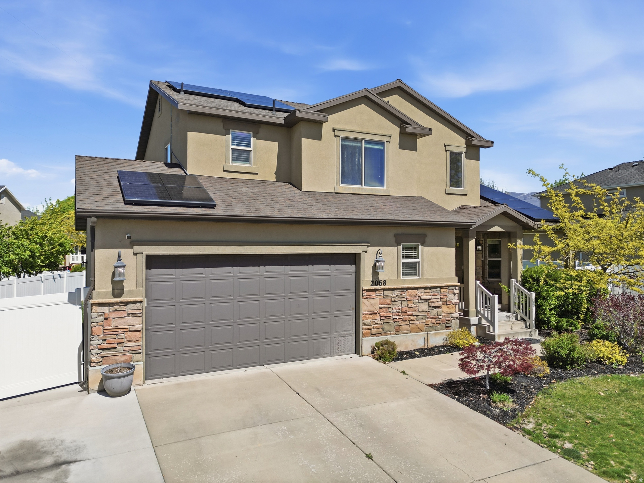 Location, location! Step into this beautiful move-in ready home where comfort, space, and lifestyle come together effortlessly. Featuring solar panels included for energy efficiency and long-term savings, this home is designed for both convenience and value. Enjoy a bright open-concept kitchen and living area, perfect for entertaining or relaxing at home. With 5 bedrooms, plus a private office/den, there's plenty of room for work, rest, and everything in between. The basement is designed to impress, offering a theater system already wired with built-in audio, a dedicated gym room, and a bonus space pre-wired for a studio setup-ideal for creatives, fitness, or multi-use living. Step outside to a large, spacious backyard, perfect for gatherings, play, or simply enjoying your own outdoor retreat. Plus, you're just a short walk to the community HOA pool and minutes from trails, parks, the freeway, shopping, and downtown Salt Lake City. To top it off, the seller is including a home warranty, giving you added peace of mind from day one.  Square footage figures are provided as a courtesy estimate only and were obtained from county records  Buyer is advised to obtain an independent measurement.