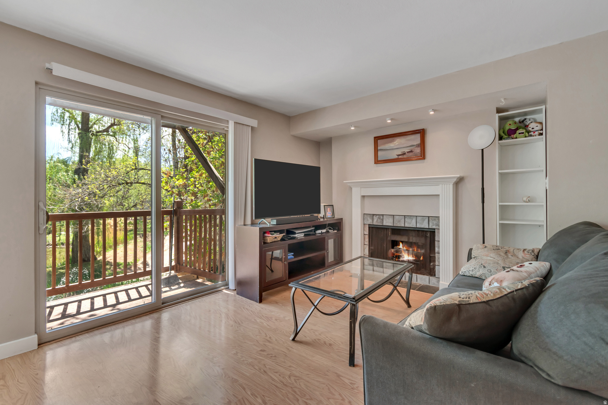 It has a garage! Yep! One of the few that does! Cute and cozy. This wonderful main level condo has easy access and great views! Sit and relax and your balcony as you watch the ducks swim by. Light up the fireplace and snuggle up with your favorite book in this lovely home. Close to everything and just a skip from the freeway, You'll love this beautiful 2 bedroom home with an updated kitchen! Come take a look!