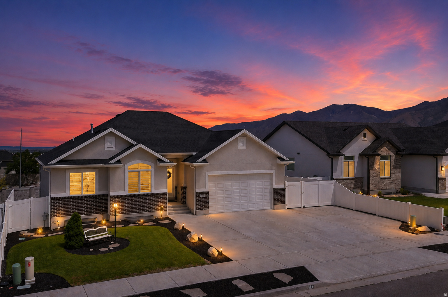 Vacant. Go & show! This south-facing beautifully upgraded 5-bed, 3-bath home in Tooele offers 3,421 square feet of comfortable living space with premium finishes throughout that make this better than a new build! This home has it all and then some! Custom plantation shutters are installed on all windows on the main floor at a cost of $12k. The great room has a wonderful vaulted ceiling with an open kitchen and solid, thick granite countertops. The master suite has plenty of room and a bathroom with all the comforts you need including convenient hand rails for added safety and support, which are also installed in the hall bathroom. The rarely used basement was professionally finished in 2023 at a cost of $60k, providing excellent additional living space with a massive family room, two additional bedrooms, abundant storage, a water softener, and a radon mitigation system already in place. Outside, you'll enjoy immaculate professional landscaping in both the front and backyard where the owners spent $24k in finishes. There's a huge RV pad and a concrete patio in the back both equaling $15k in cost. Best of all, the back windows offer a view of the Deseret Peak LDS Temple and the Great Salt Lake from the deck. All furniture in the home, including the kitchen table, is included. This is more than just a house, it's a turnkey home where the owners have invested over $110,000 in thoughtful improvements. Whether you're looking for room to grow, entertain, or to simply enjoy low-maintenance luxury, this property checks every box.