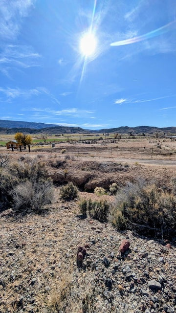 The property has recently received a significant upgrade! A professional excavation crew cleared the land, removing old timber, fencing, and debris, and leveling key areas for easy access and development. All this work sets the stage for whatever your dreams decide-whether it's building your dream home looking across the valley or creating your own private hunting retreat, known for attracting nice bucks! Enjoy the quiet living this land offers, with the beautiful Fremont River running along the lower section of your property. Location & Outdoor Paradise Nestled below the stunning Fremont Ledges with straight access to Mytoge Mountain right from your backyard. Stunning views looking out to the Fremont Valley. Just minutes away from Mill Meadow & Forsyth Reservoirs, and Fishlake.