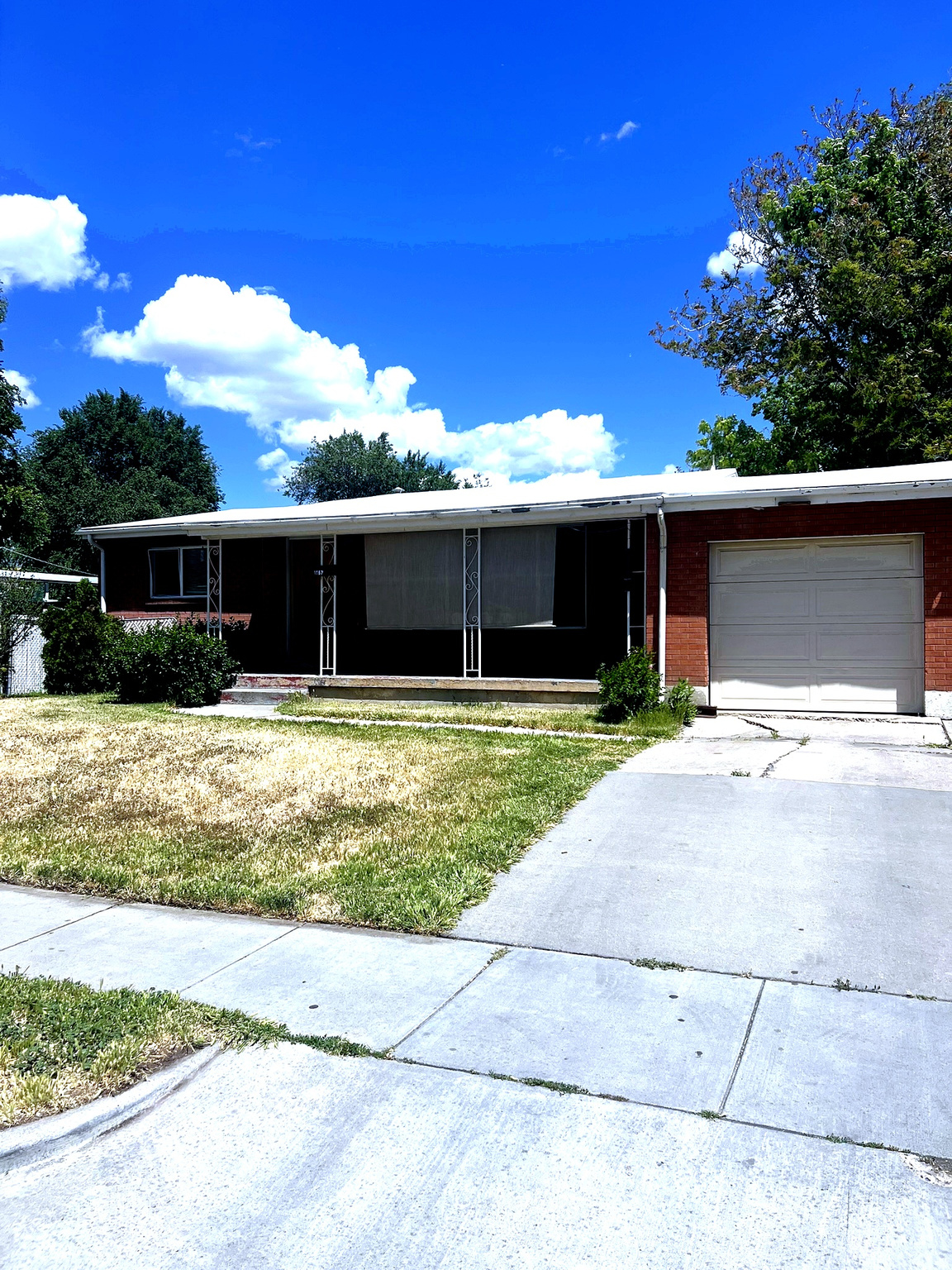 A 1954 single-story rambler in Salt Lake City's established Glendale neighborhood. Original galvanized plumbing has been fully replaced and the HVAC has been updated. 1,696 sqft of comfortable living, 3 bedrooms (2 finished), 1 bathroom, and a partial basement with room to grow. Set on a generous 0.26-acre lot with the preferred east-facing backyard. Quick access to downtown, I-15, and the airport. Occupied, call/text for showing details.