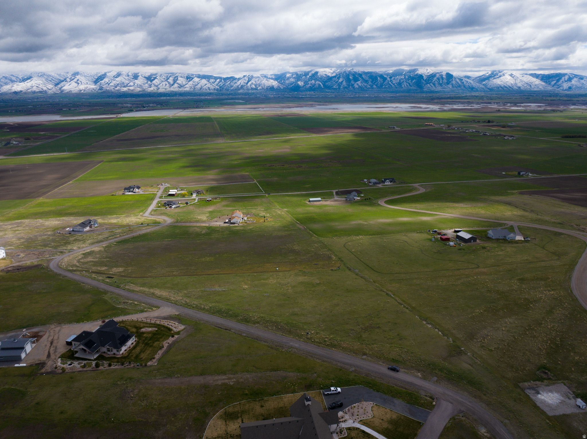 Discover the perfect building spot on this stunning 11.81 acre property, offering breathtaking panoramic mountain views.  This exceptional parcel is ready for your dream home with power and phone stubbed for easy access.  1 well permit with 1.73 acre feet of water currently approved for 1 home, 1.4 acre of yard and 10 head of livestock. Enjoy privacy, open space, and nature while staying conveniently close to necessities with Logan or I-15 only 20 minutes away.  Whether you're looking for a peaceful retreat or an investment opportunity, this land is a rare find! Buyer to verify all information.