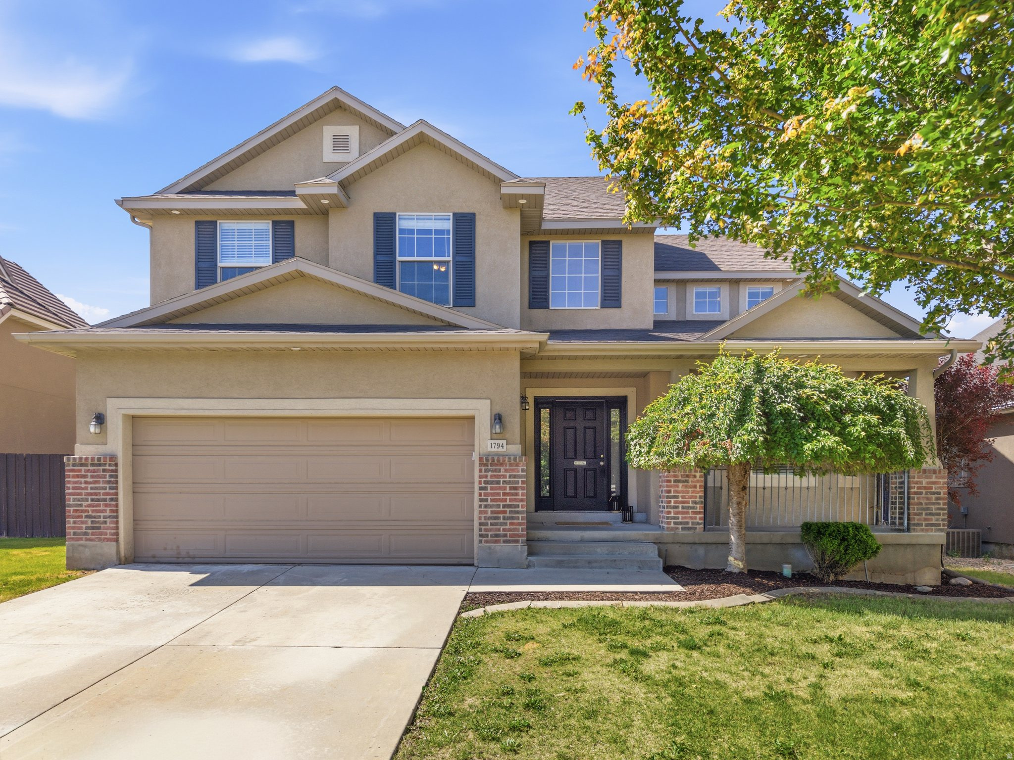 **PRICE DROP!** Spacious 6-bedroom, 4-bath home offering 3,175 sq ft of comfortable living space, perfect for a growing family! Enjoy mountain views and the beauty of mature trees in the front and back yards, an open-concept kitchen and family room, and a cozy fireplace ideal for entertaining, plus a home office space on the main floor. The finished basement provides additional living and recreation space. Relax in the principal suite featuring a jetted tub. Major updates include a one-year-old HVAC system and refrigerator and new dishwasher.  Close to schools and parks.