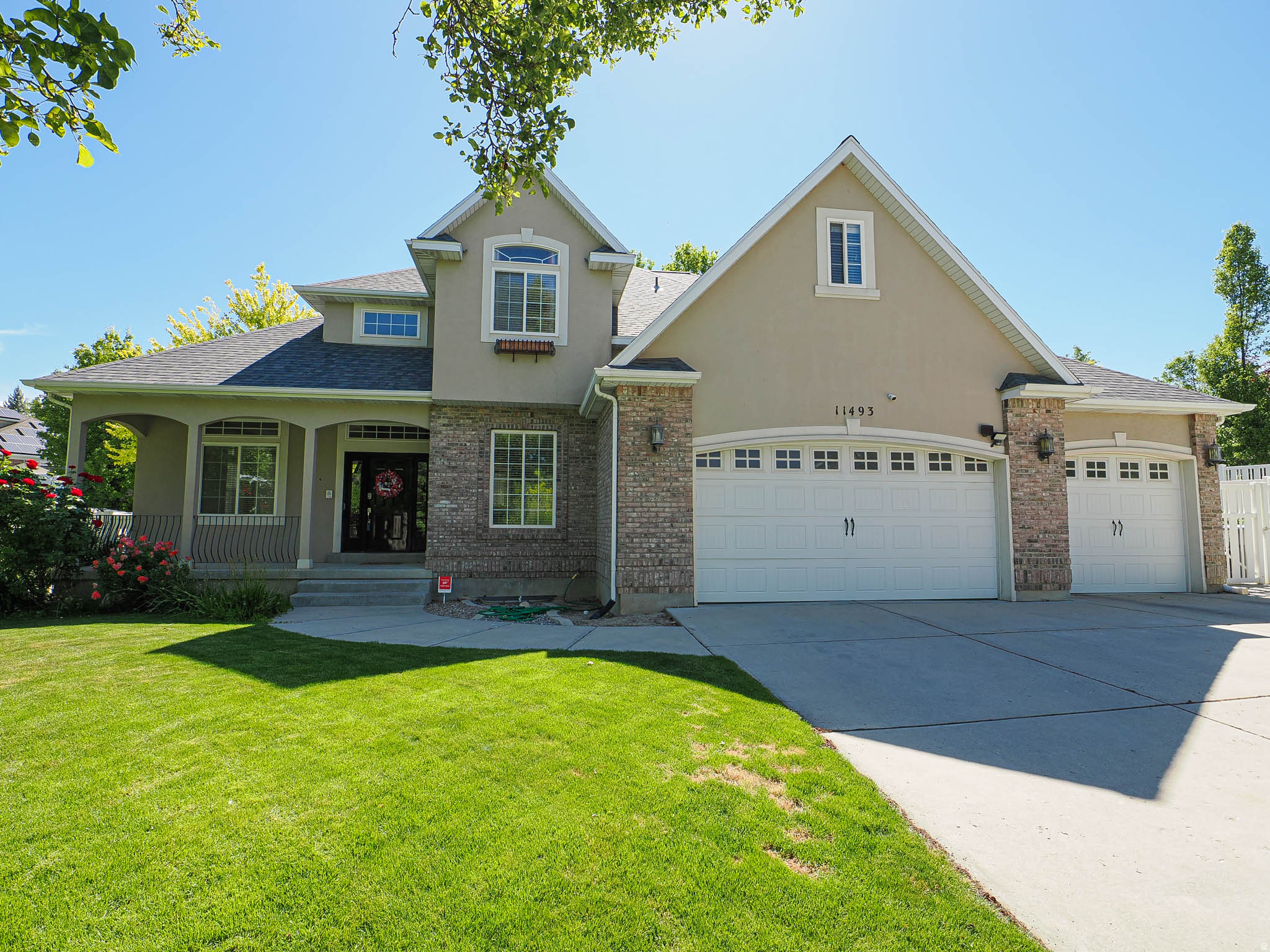 STUNNING SOUTH JORDAN RETREAT | NEW PAINT & CARPET | CORNER LOT Located in the heart of South Jordan, this elegant residence has been beautifully refreshed with brand-new carpet and professional paint, creating an interior that is remarkably open, bright, and move-in ready. Situated on a premier corner lot, this home offers the perfect blend of luxury and functionality with 6 spacious bedrooms and 3.5 bathrooms. The main level showcases refined living spaces anchored by two cozy fireplaces. Retreat to the expansive primary suite, featuring a private balcony and a unique "hidden" bonus room accessed through the closet-perfect for a nursery, executive office, or private lounge. The fully finished basement is an entertainer's dream, complete with a second kitchen and a dedicated kids' playroom, making it ideal for multi-generational living or guests. The outdoor amenities are unparalleled: Recreation: Private basketball court, charming fire pit area, and built-in swing set. Hobbies: Thriving vegetable garden and 3 storage sheds. Parking: Extra-long 3rd-car garage plus dedicated RV parking for all your toys. This exceptional property combines space, elegance, and thoughtful amenities in an unbeatable location. Schedule your tour today!