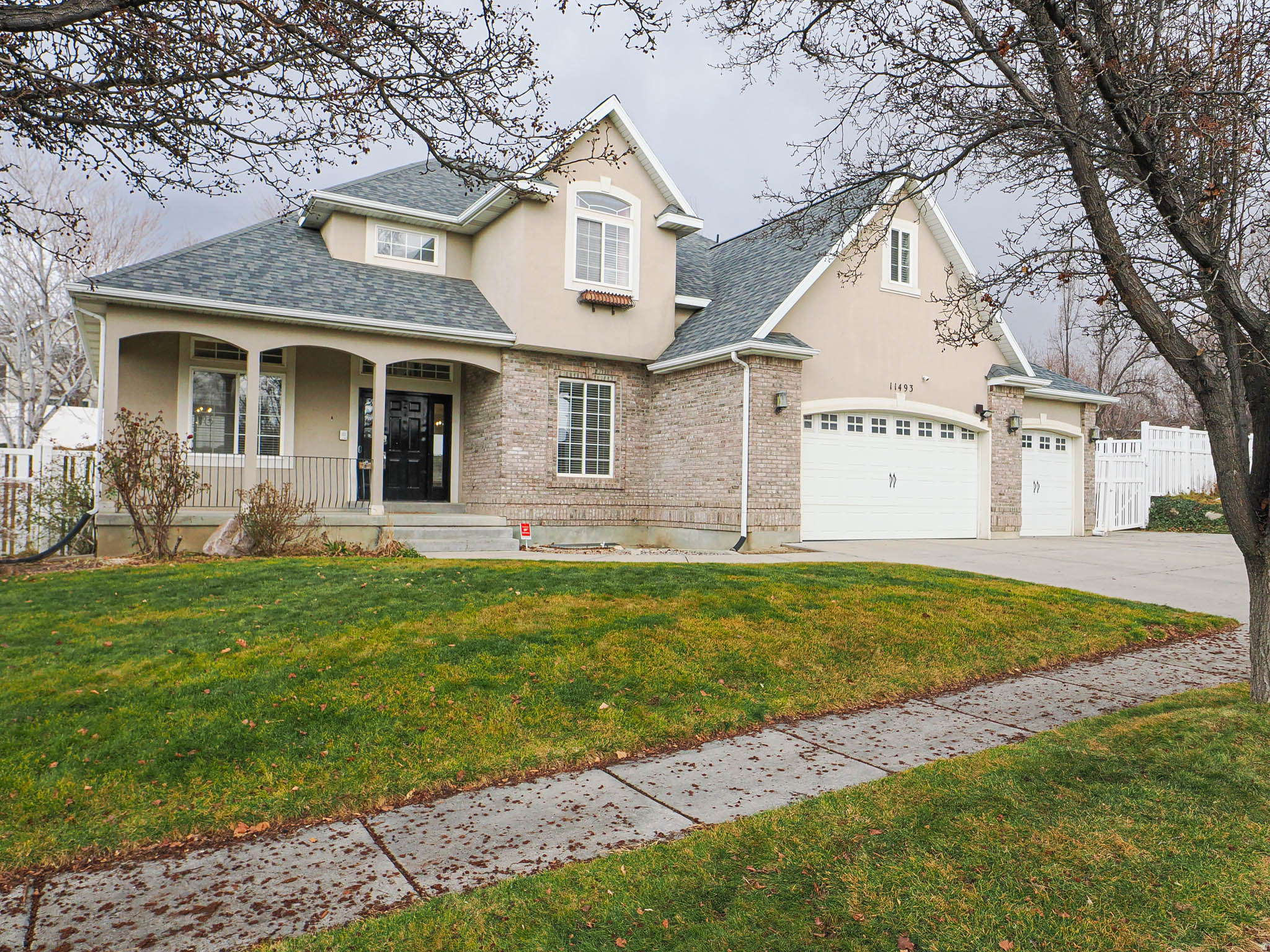 STUNNING SOUTH JORDAN RETREAT | NEW PAINT & CARPET | CORNER LOT Located in the heart of South Jordan, this elegant residence has been beautifully refreshed with brand-new carpet and professional paint, creating an interior that is remarkably open, bright, and move-in ready. Situated on a premier corner lot, this home offers the perfect blend of luxury and functionality with 6 spacious bedrooms and 3.5 bathrooms. The main level showcases refined living spaces anchored by two cozy fireplaces. Retreat to the expansive primary suite, featuring a private balcony and a unique "hidden" bonus room accessed through the closet-perfect for a nursery, executive office, or private lounge. The fully finished basement is an entertainer's dream, complete with a second kitchen and a dedicated kids' playroom, making it ideal for multi-generational living or guests. The outdoor amenities are unparalleled: Recreation: Private basketball court, charming fire pit area, and built-in swing set. Hobbies: Thriving vegetable garden and 3 storage sheds. Parking: Extra-long 3rd-car garage plus dedicated RV parking for all your toys. This exceptional property combines space, elegance, and thoughtful amenities in an unbeatable location. Schedule your tour today!
