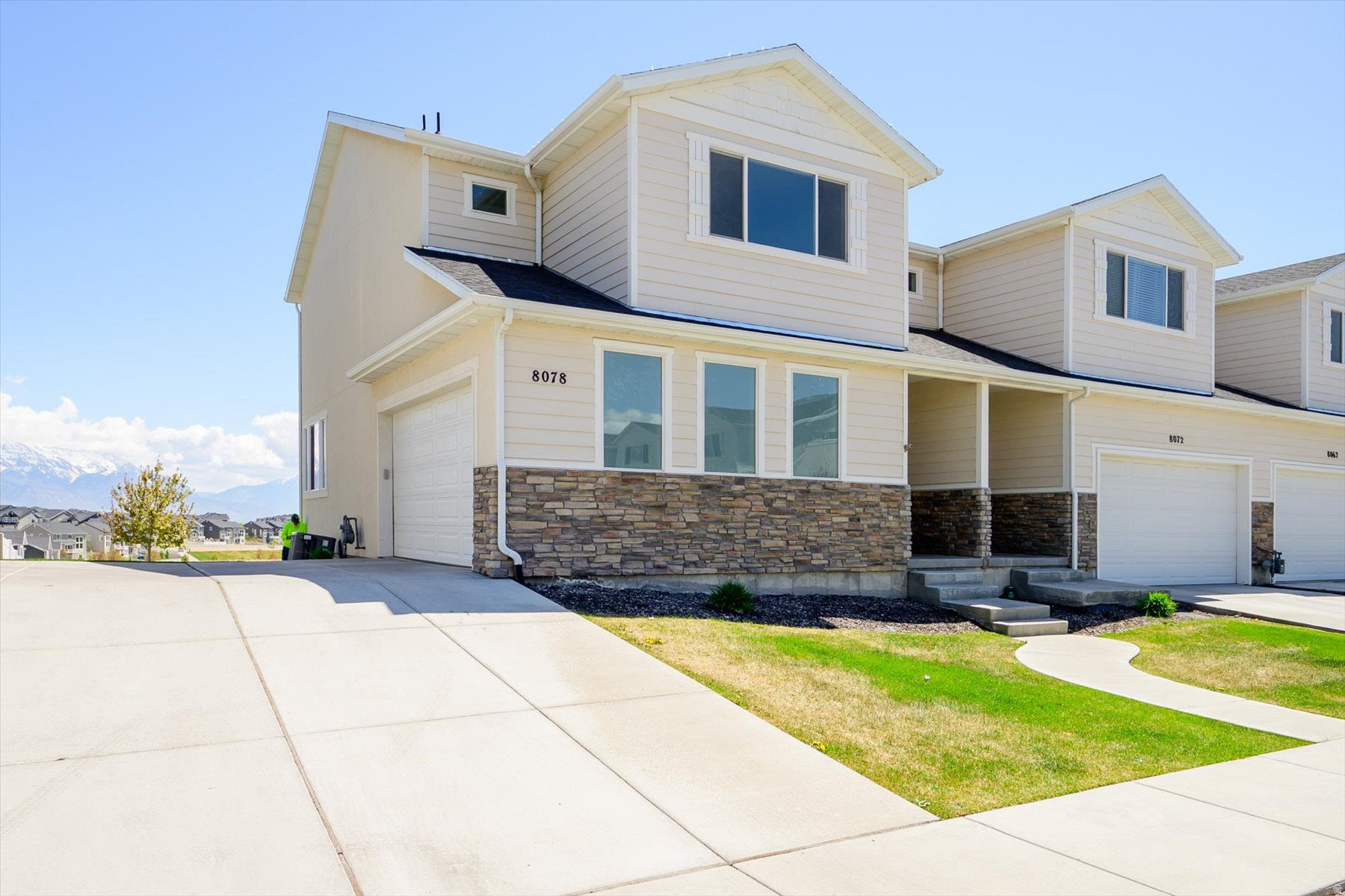 Pony Express Townes in Eagle Mountain. End-unit townhome with views of the Wasatch Range, Timpanogos, and Utah Lake. Open-concept layout, granite countertops, and 2-car built-in garage with extra height. HOA covers landscaping and grounds. Near shopping, schools, and Pony Express Pkwy. Tenant-occupied through May 31, 2026; 24-hour notice required for showings. Lease includes 30-day termination clause upon signed earnest money agreement.