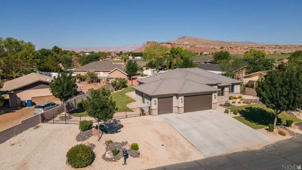 Discover your perfect St. George home in the highly sought-after Bloomington Hills neighborhood. This beautifully maintained 4 bedroom, 2.5 bath residence offers an ideal blend of comfort, convenience, and value, just minutes from top-rated schools, shopping, dining, golf, and parks. Zoned schools include Bloomington Hills Elementary, Sunrise Ridge Intermediate, Desert Hills Middle School, and Desert Hills High School, which each school is only a short distance away. Please verify boundaries if important. Conveniently located minutes from Sprouts Farmers Market and Dixie Meats.  Little Valley Park is very near too.