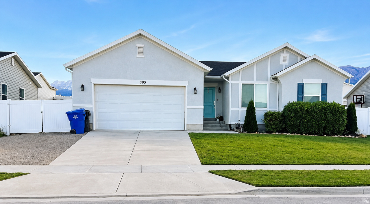 Beautiful 3-bedroom, 2-bath home built in 2020 in a quiet Grantsville neighborhood! This well-maintained property features modern finishes, an open and inviting layout, a one year old tankless water heater, and energy-efficient HVAC for added comfort and savings. Enjoy the fully fenced yard on a spacious 7,013 sq ft lot with RV parking. Plenty of space in the 3 car garage. Conveniently located near schools, parks, and local amenities, this home combines comfort, style, and small-town charm.