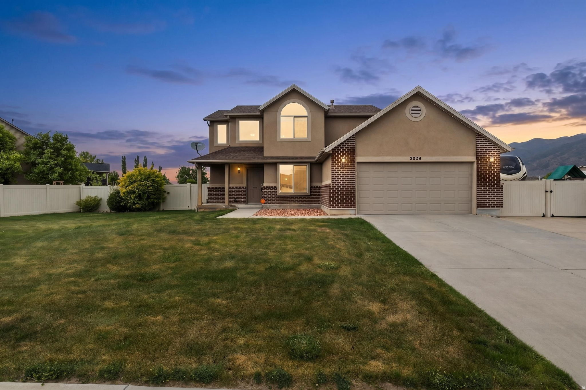Nestled in the desirable Farmington Ranches neighborhood, this charming two-story home offers the perfect blend of convenience and comfort. Just minutes from Station Park's premier shopping, dining and entertainment, Lagoon Amusement Park, and quick access to I-15 & the Legacy Parkway. Commutes to Salt Lake or Ogden are a breeze!   The kitchen features beautiful wood flooring, nice cabinetry, newer appliances, and easy access to the back patio and yard are perfect for entertaining. Just off the main entry, an office with glass and  private workspace add convenience. Upstairs, the primary suite boasts scenic views, along with a separate tub and shower. The fully fenced backyard is open and private featuring well-manicured grounds, RV parking, a storage shed, and plenty of space for summer barbecues, evenings around the gas fire pit, and breathtaking sunset views. There are outdoor fixed Govee programable lighting system which add to the ambience.   Square footage figures are provided as a courtesy estimate only. Buyers are advised to verify all measurements independently.