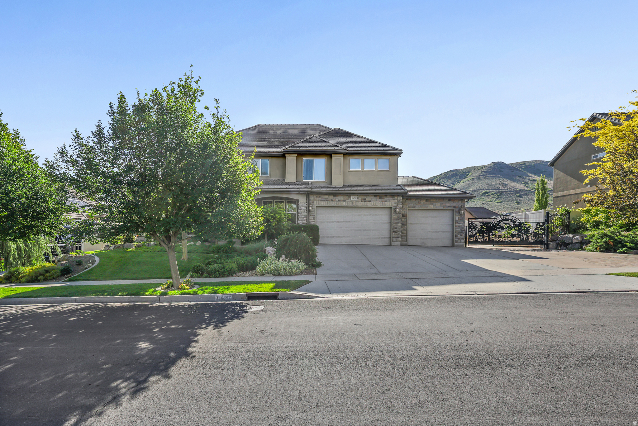 Rare multigenerational home in coveted Phase I of the Cove at Herriman Springs! This approximately 7,000-square-foot property offers three-level living, a private basement apartment with separate entrance, generous gathering spaces, a luxury primary suite, bonus room flexibility, RV parking with breaker-ready power, and beautifully landscaped outdoor living with fruit trees, garden space, and an east-facing Trex deck-all near trails and the Cove pond.  Home is priced with your updates in mind.  You choose the next chapter of design and decor.  Transform this incredible space and make it your style.  Location, square footage and functionality await.