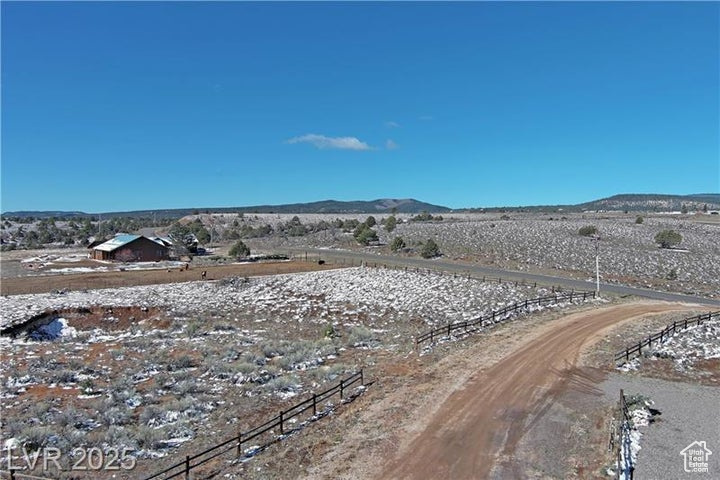 Tucked in a quiet cul-de-sac off Old Hwy 89, this 1.27-acre lot in Bryce Gate offers the perfect blend of seclusion & access. Fully fenced with a wood perimeter, community well (1/4 acre ft water included), & power stubbed to the lot, it's ready for your dream build whether a nightly rental or single-family home. Join a growing vacation hot spot with 4 neighboring homes already hosting rentals. Ideally situated between Zion & Bryce Canyon, & minutes from Grand Staircase-Escalante, Coral Pink Sand Dunes, & charming historic towns. A prime base-camp for outdoor adventure, investment, or both!